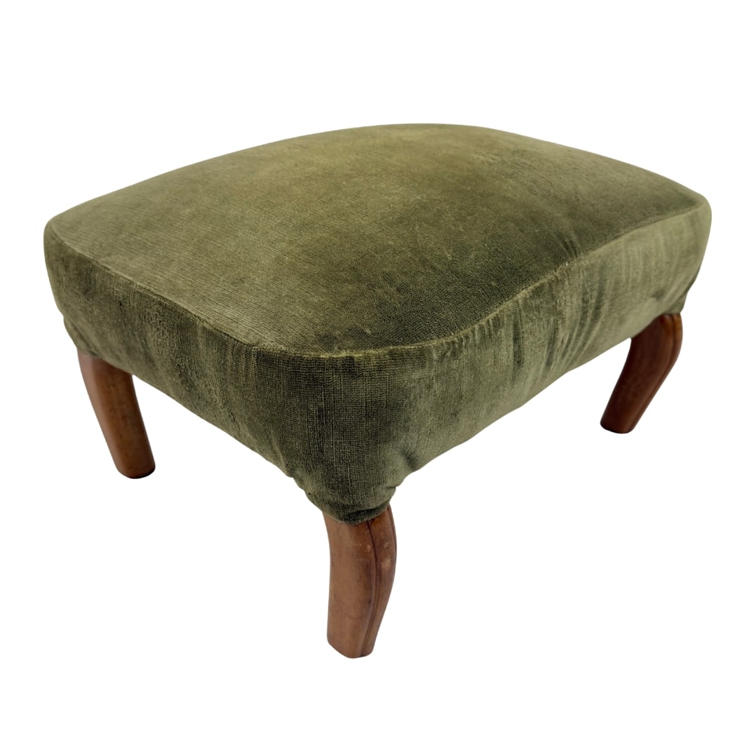 VINTAGE FRENCH FOOTSTOOL: Dimensions: H 12.5” x W 18.7” x D 15”. Vintage French footstool with original green velvet upholstery and curved legs.