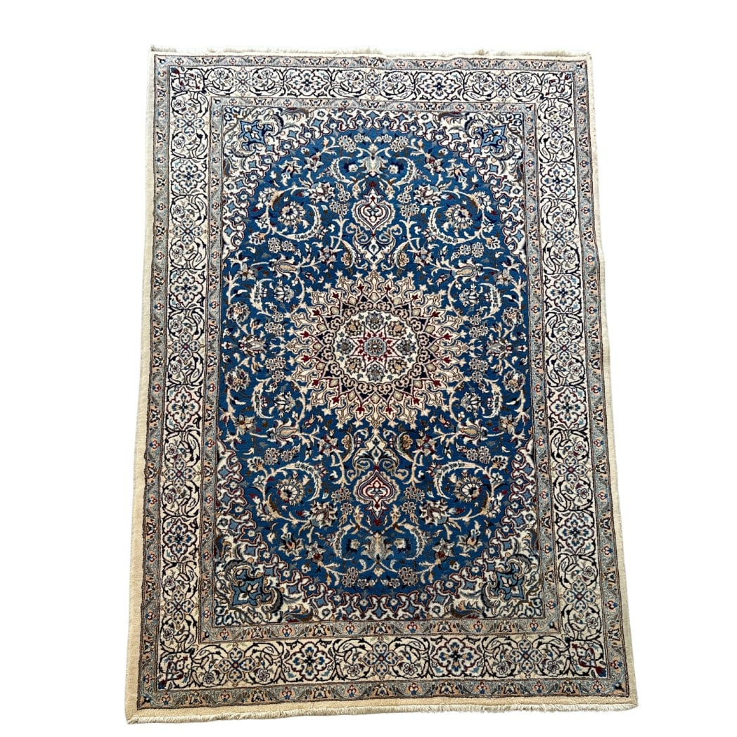 BLUE PERSIAN NAIN RUG: Dimensions: H 9'11" x W 6'4". Blue Persian Nain wool rug with centric design.