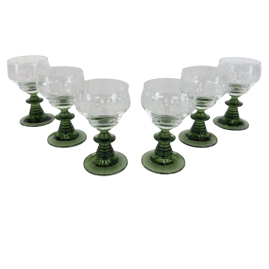 (6) ROEMER GREEN STEMMED WINE GLASSES: Dimensions: H 4.7” x W 2.5”. Set of 6 Vintage German Roemer green stemmed wine glasses with etched grapevine pattern.