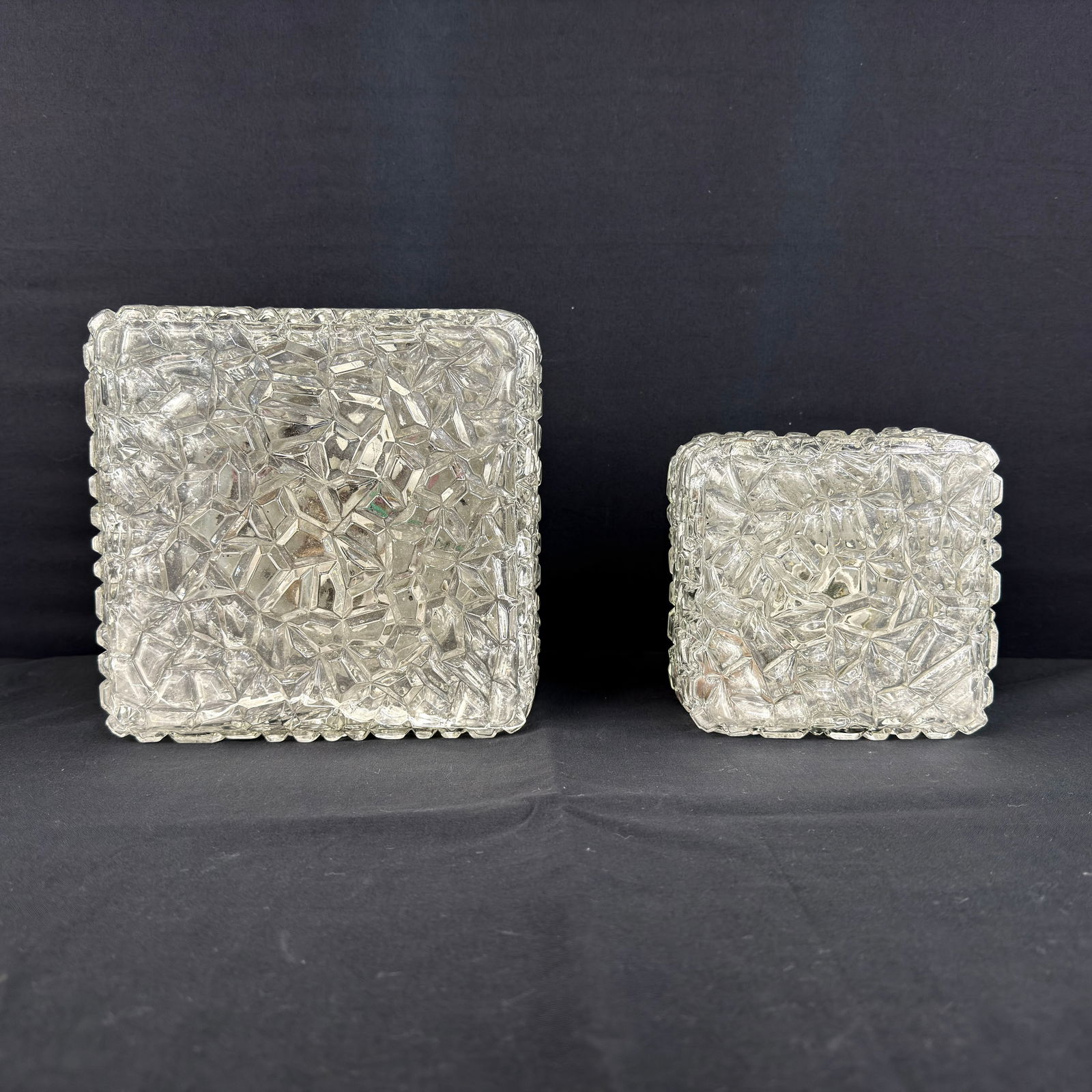 VINTAGE ITALIAN WALL SCONCES, A PAIR: Dimensions: H 4.7” x W 8.5” x D 8.5”. Pair of Vintage Italian cut crystal glass rectangular wall sconces. Dimensions: (small sconce) H 4.5” x W 5.7” x D 5.7”.