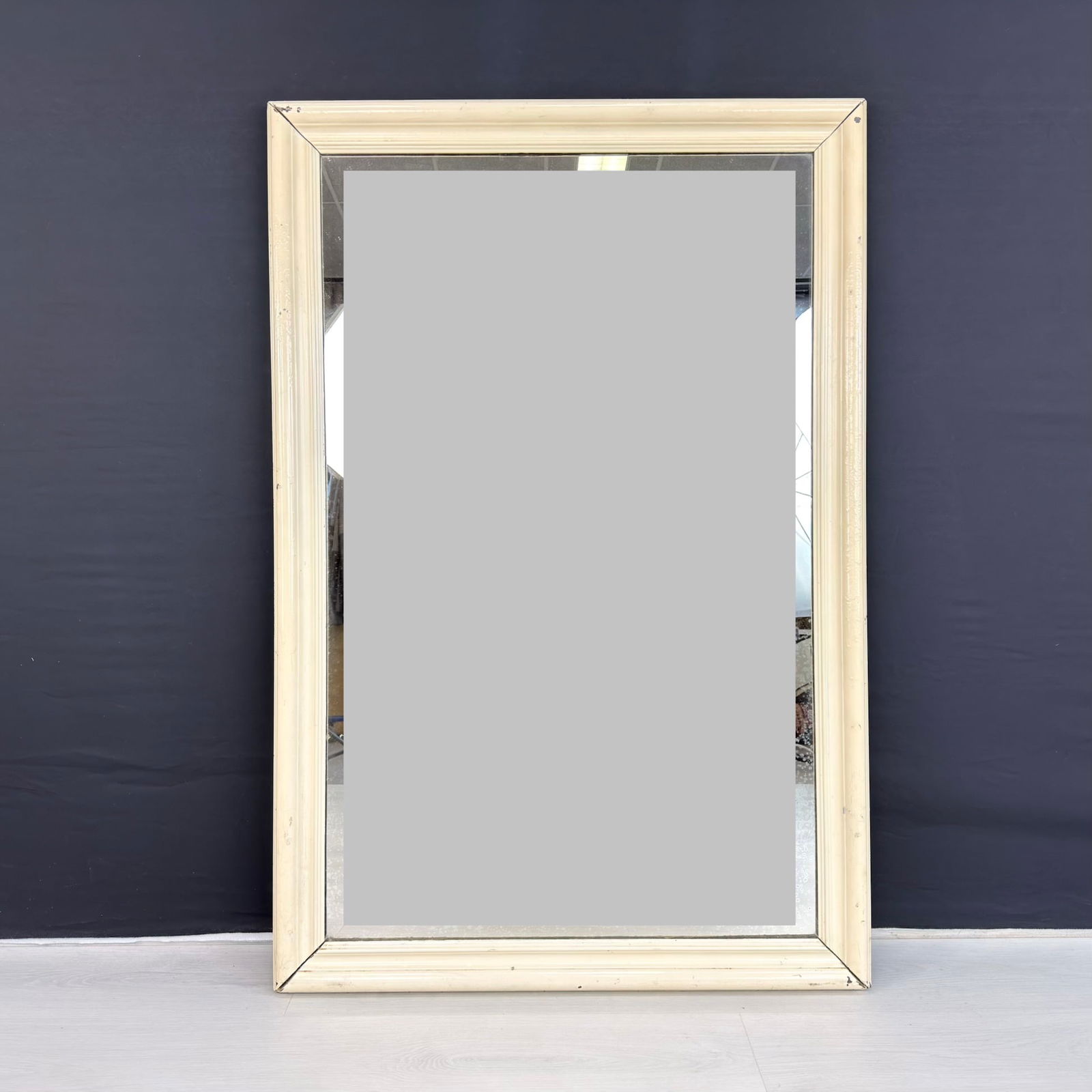 VINTAGE FRENCH MIRROR: Dimensions: H 48.3” x W 32”. Vintage French off-white painted wall mirror.