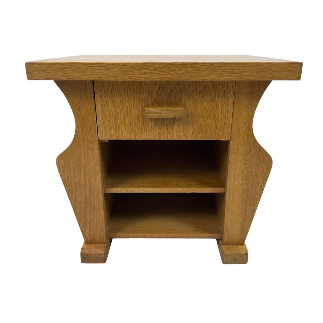 VINTAGE ART DECO SIDE TABLE,1980s: Dimensions: H 18” x W 19.7” x D 17.7”. Vintage Art Deco side table with compartment for magazines on each side, one central drawer and one shelf.