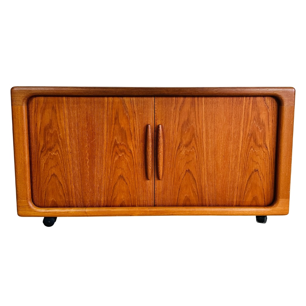 DYRLUND TEAK SIDEBOARD, 1970s: Dimensions: H 30” x W 73.5” x D 29” x SH 17.5”. Vintage Danish teak three-seater sofa attr. to Ole Wanscher for Cado, newly upholstered in dark grey fabric.