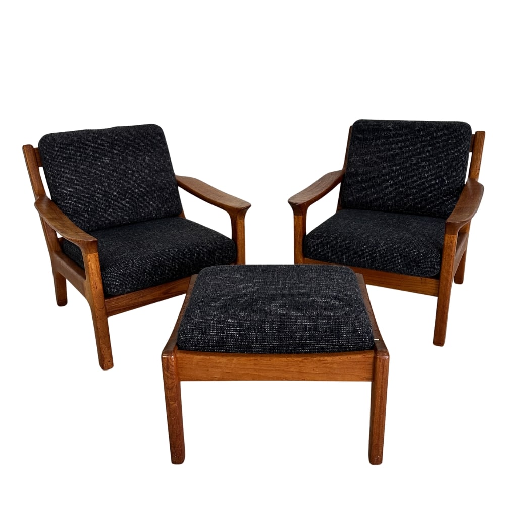 (2) SCANDINAVIAN ARMCHAIRS WITH OTTOMAN: Dimensions: H 29.7” x W 29.3” x D 28” x SH 17.5”. Pair of Vintage Danish teak armchairs with ottoman manner of Ole Wanscher for Cado, upholstered in dark grey fabric. 
