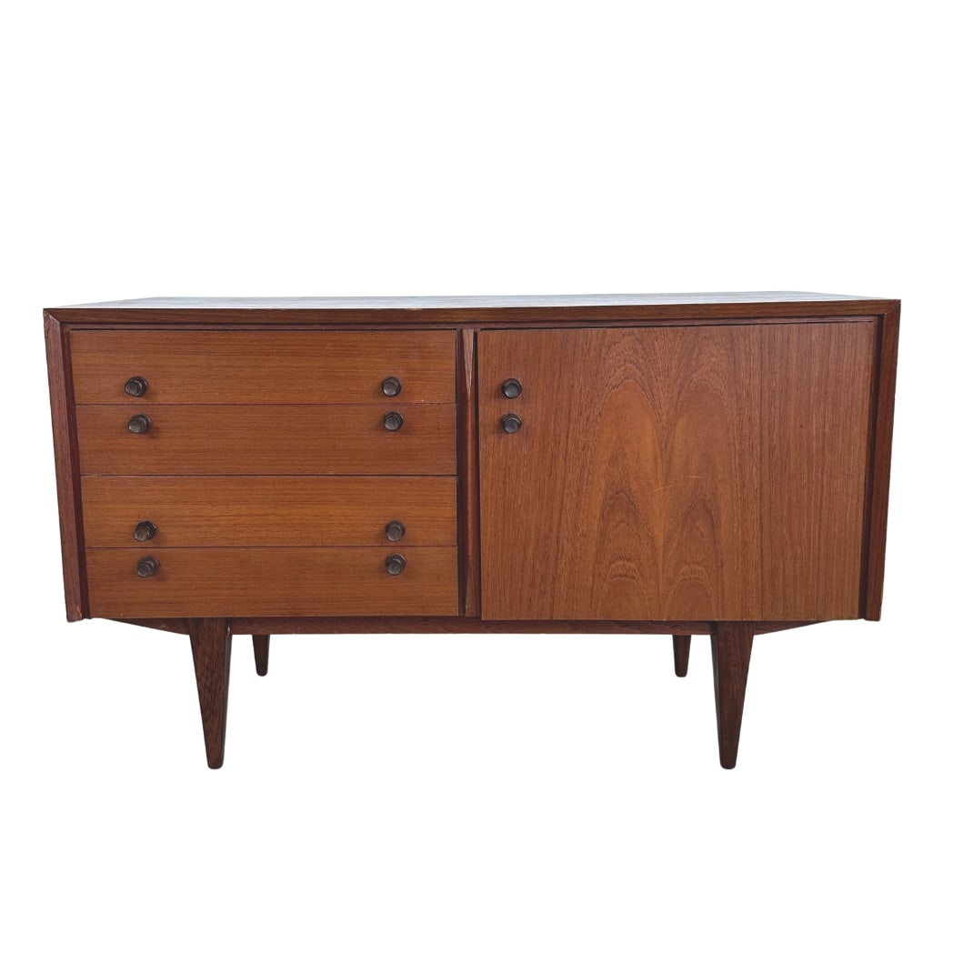 VINTAGE DANISH SIDEBOARD: Dimensions: H 23.5” x W 38.5” x D 16.5”. Vintage Danish sideboard with 4 drawers and a cupboard with shelf inside.