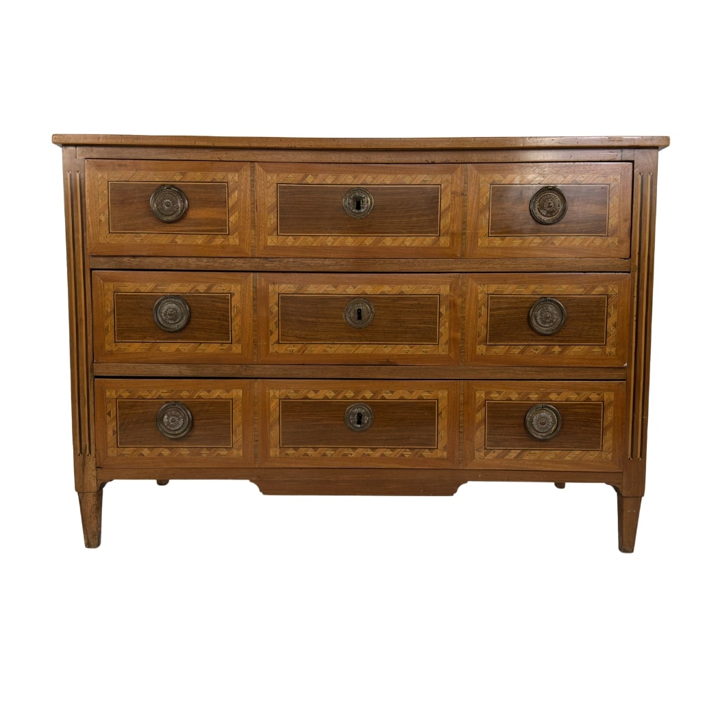 ANTIQUE LOUIS XVI MARQUETRIE CHEST OF DRAWERS: Dimensions: H 35.3” x W 50” x D 23.5”. Antique Louis XVI style inlaid chest of drawers with three drawers with brass handles and locks. One key available.