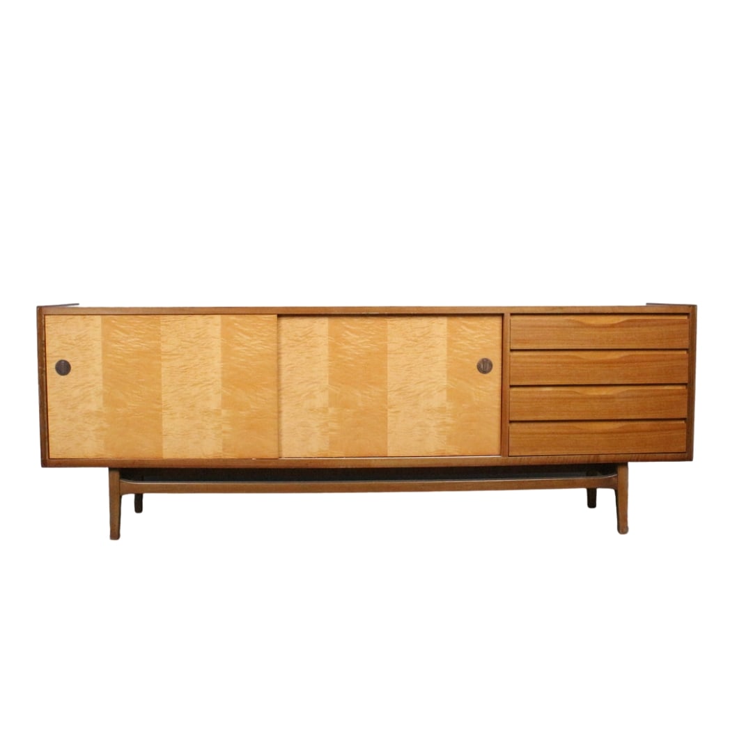 VINTAGE SIDEBOARD, GERMANY 1960s: Dimensions: H 17.1” x W 90.5” x D 19.6”. Vintage German walnut veneer sideboard from the 1960s with two sliding doors with shelf inside and four drawers.