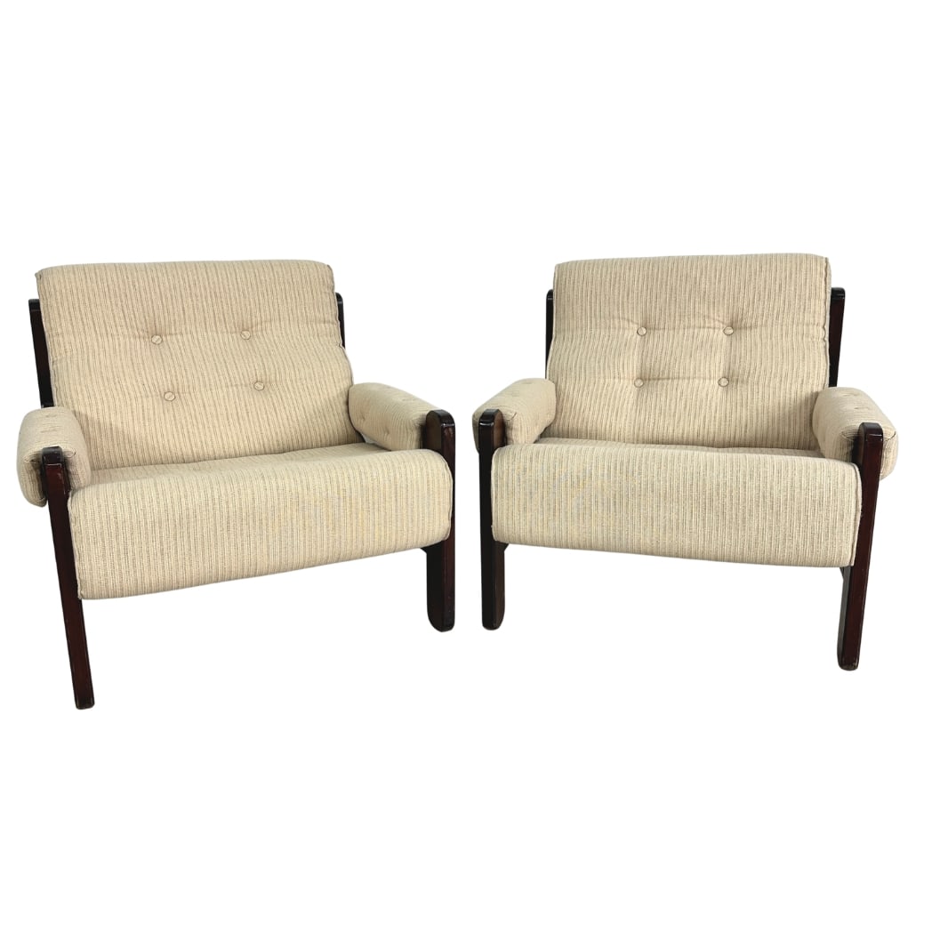 DANISH LOUNGE CHAIRS, A PAIR: Dimensions: H 27.5” x W 31.5” x SD 20.3”x SH 16.3”. Pair of Vintage Danish lounge chairs with dark wood frame and original beige fabric cushions.