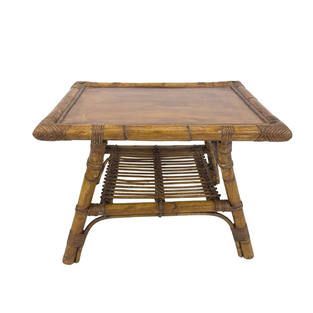 ITALIAN BAMBOO COFFEE TABLE: Dimensions: H 19.5” x W 27” x D 20.5”. Vintage Italian bamboo and rattan coffee or side table with lower shelf.
