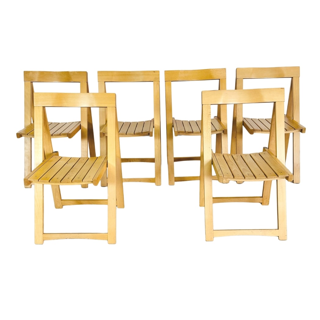 (6) ALDO JACOBER FOLDING CHAIRS, 1960s: Dimensions: H 30.5” x W 17.9” x D 17.9” x SH 17.7”. Set of 6 Vintage Italian Trieste folding chairs designed by Aldo Jacober for Alberto Bazzani, new in box.
