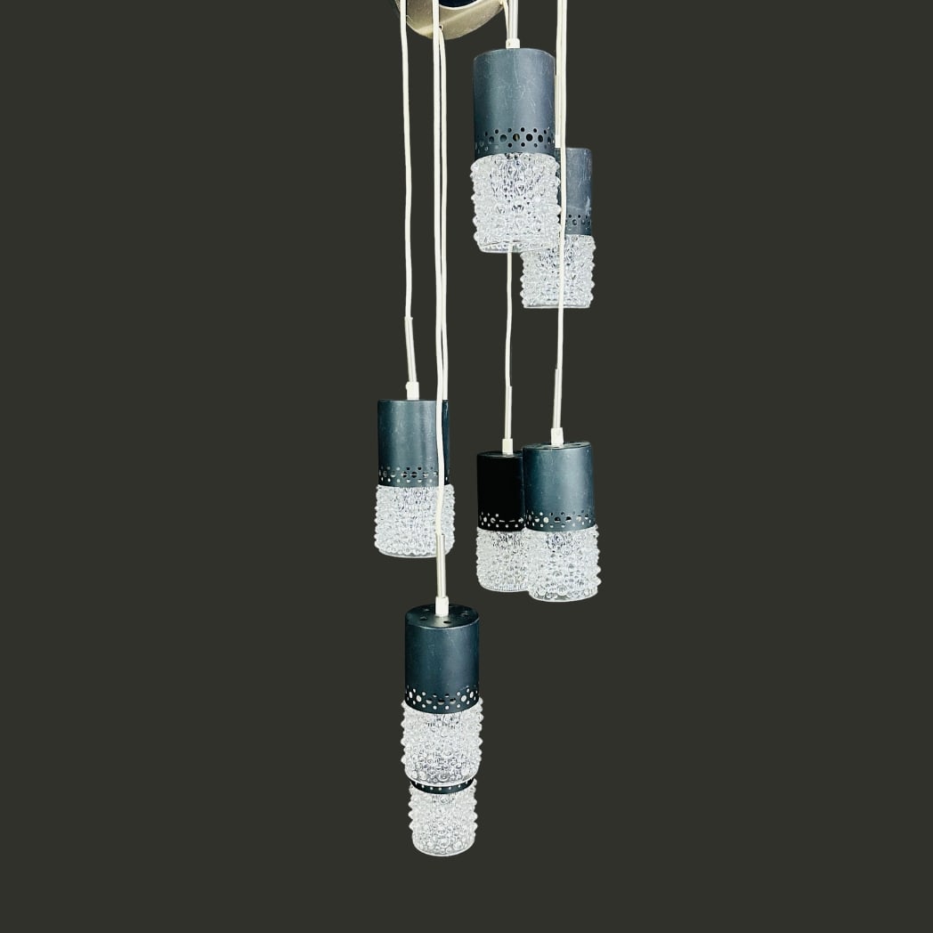 BELGIAN SPACE AGE CASCADE PENDANT LAMP: Dimensions: H 40.5” x W 13”. Vintage Belgian Space Age Cascade pendant lamp with 7 bubbled glass shades and chrome metal support.