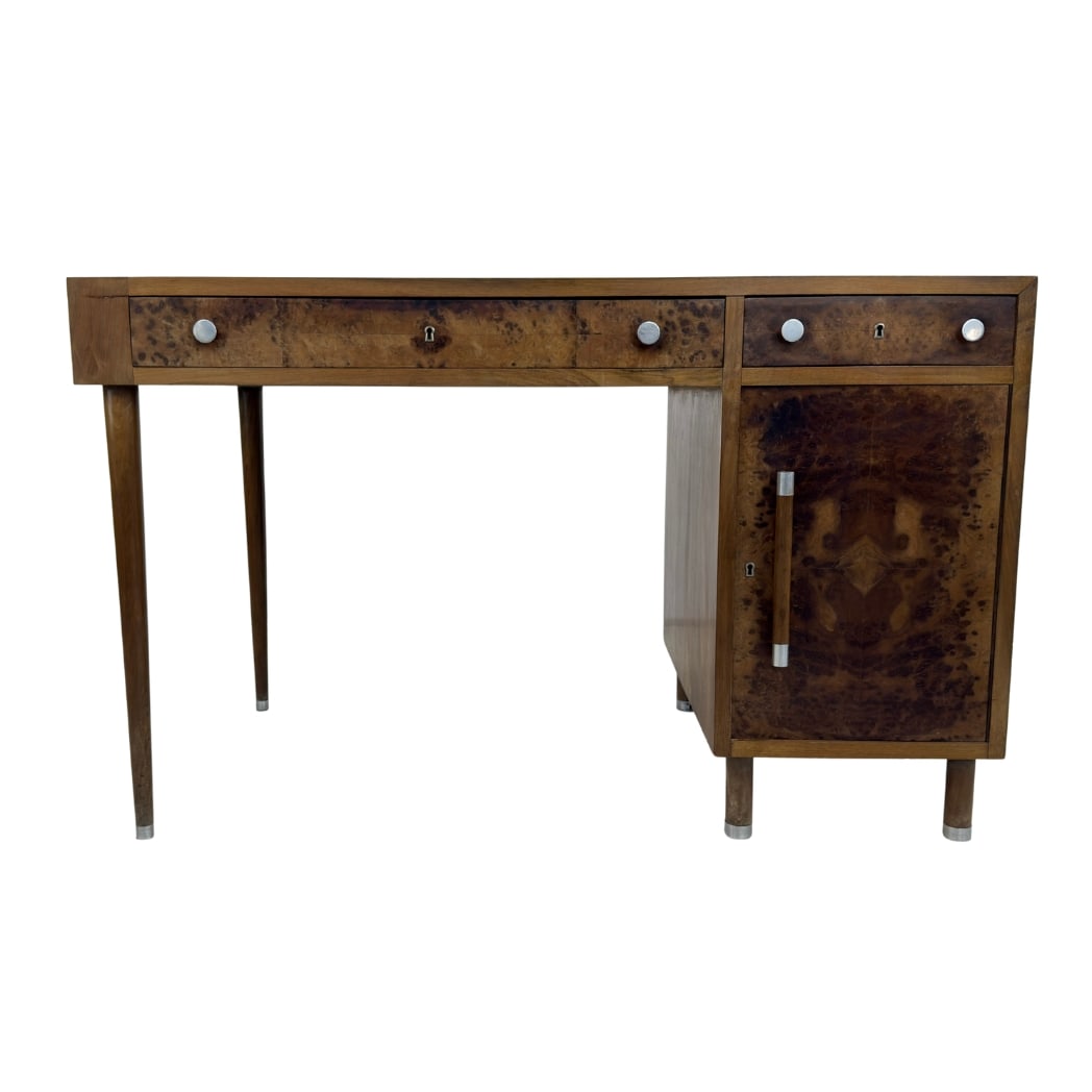 ITALIAN ART DECO DESK: Dimensions: H 31” x W 49.5” x D 27.5”. Italian Art Deco desk with two drawers and one cupboard with shelf inside.