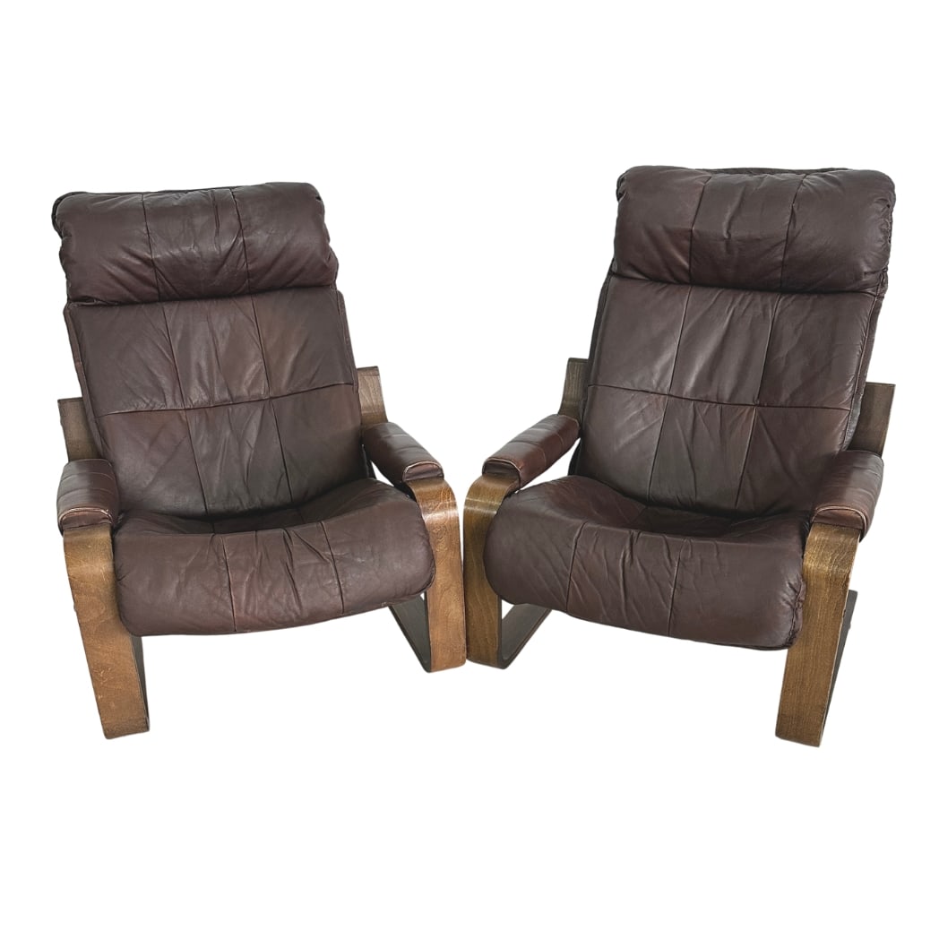 LEATHER ARMCHAIRS ATTR. TO ARNT LANDE FOR WESTNOFA, A PAIR: Dimensions: H 35.5” x W 29.3” x D 30” x SH 16”. Pair of Vintage bentwood lounge chairs in brown leather attr. to Arnt Lande for Westnofa.