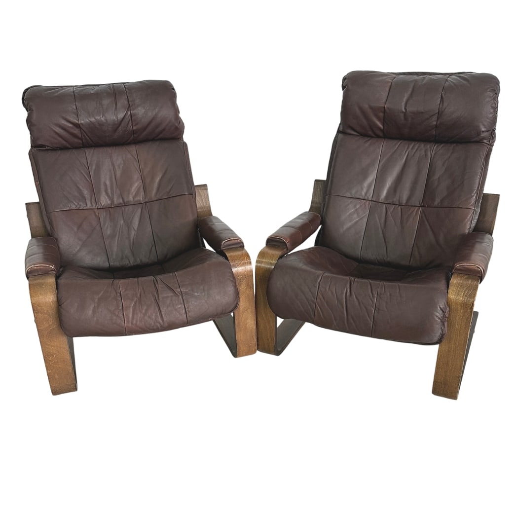 LEATHER ARMCHAIRS ATTR. TO ARNT LANDE FOR WESTNOFA, A PAIR: Dimensions: H 35.5” x W 29.3” x D 30” x SH 16”. Pair of Vintage bentwood lounge chairs in brown leather attr. to Arnt Lande for Westnofa.