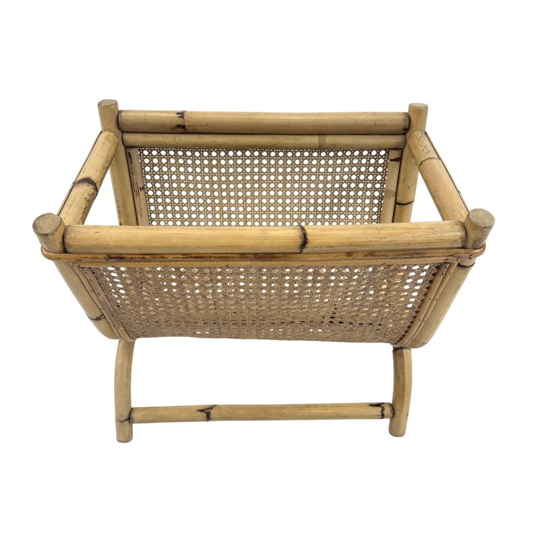 VINTAGE BAMBOO AND RATTAN MAGAZINE RACK: Dimensions: H 17” x W 18” x D 11.5”. Vintage Italian bamboo and rattan magazine rack.