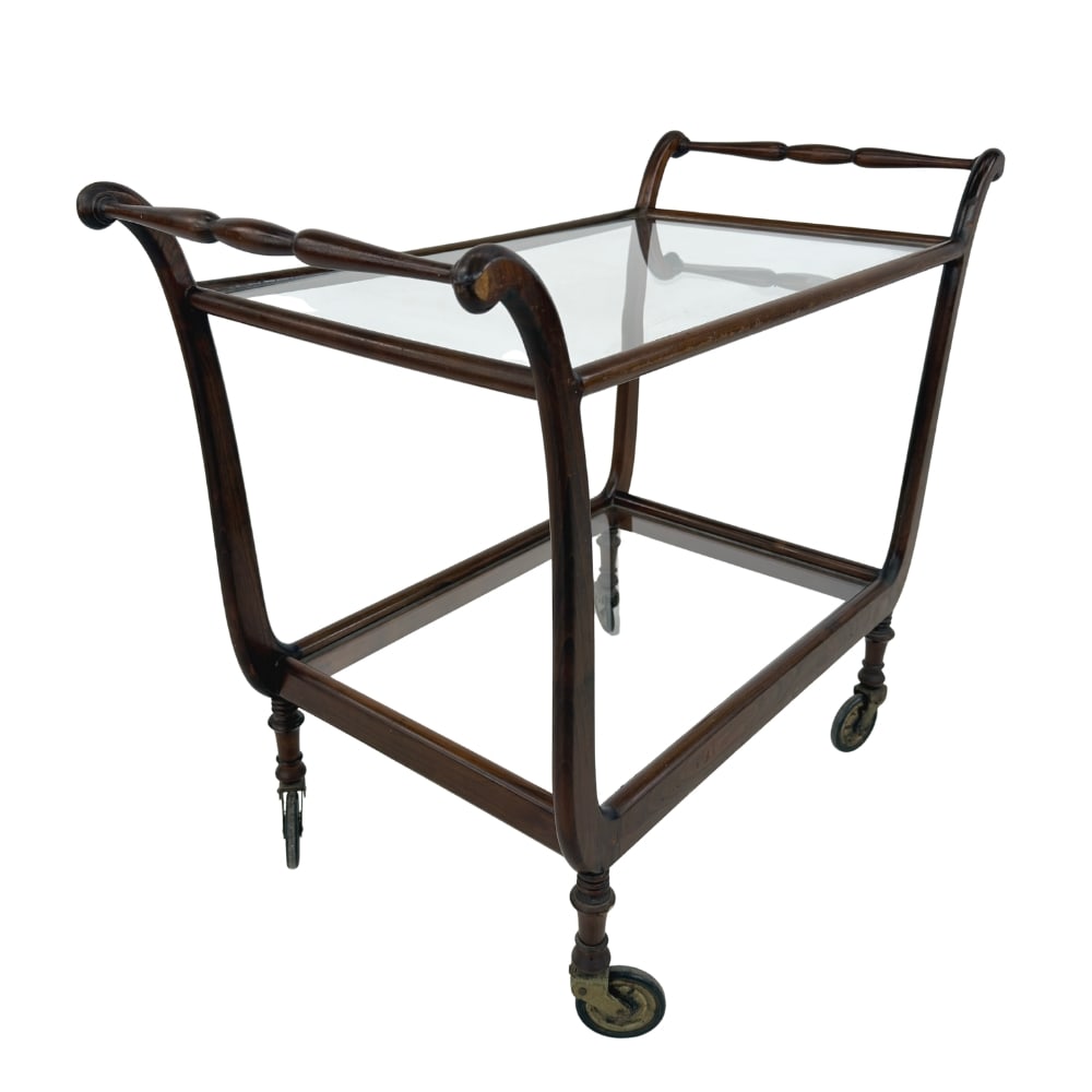 ITALIAN SERVING TROLLEY: Dimensions: H 25” x W 33.5” x D 17”. Mid-Century Modern Italian serving trolley with wooden frame and glass shelves.