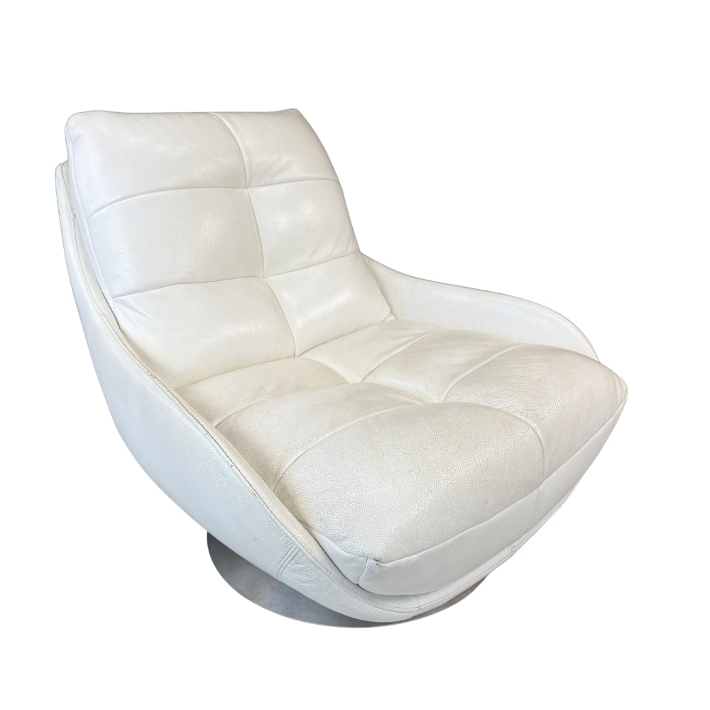 VINTAGE WHITE LEATHER ARMCHAIR: Dimensions: H 35” x W 38.5” x D 39.5” x SH 17”. Chateau d”Ax designer swivel armchair in original white leather, with round metal base.