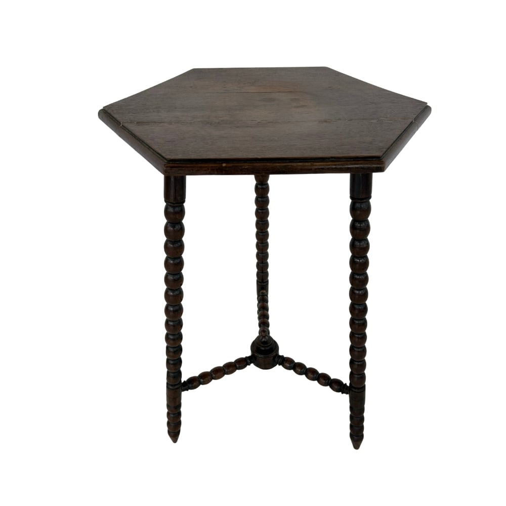 ITALIAN HEXAGNAL SIDE TABLE: Dimensions: H 28.3” x W 17.5”. Vintage Italian hexagonal side table with bobbin-turned legs with stretcher.