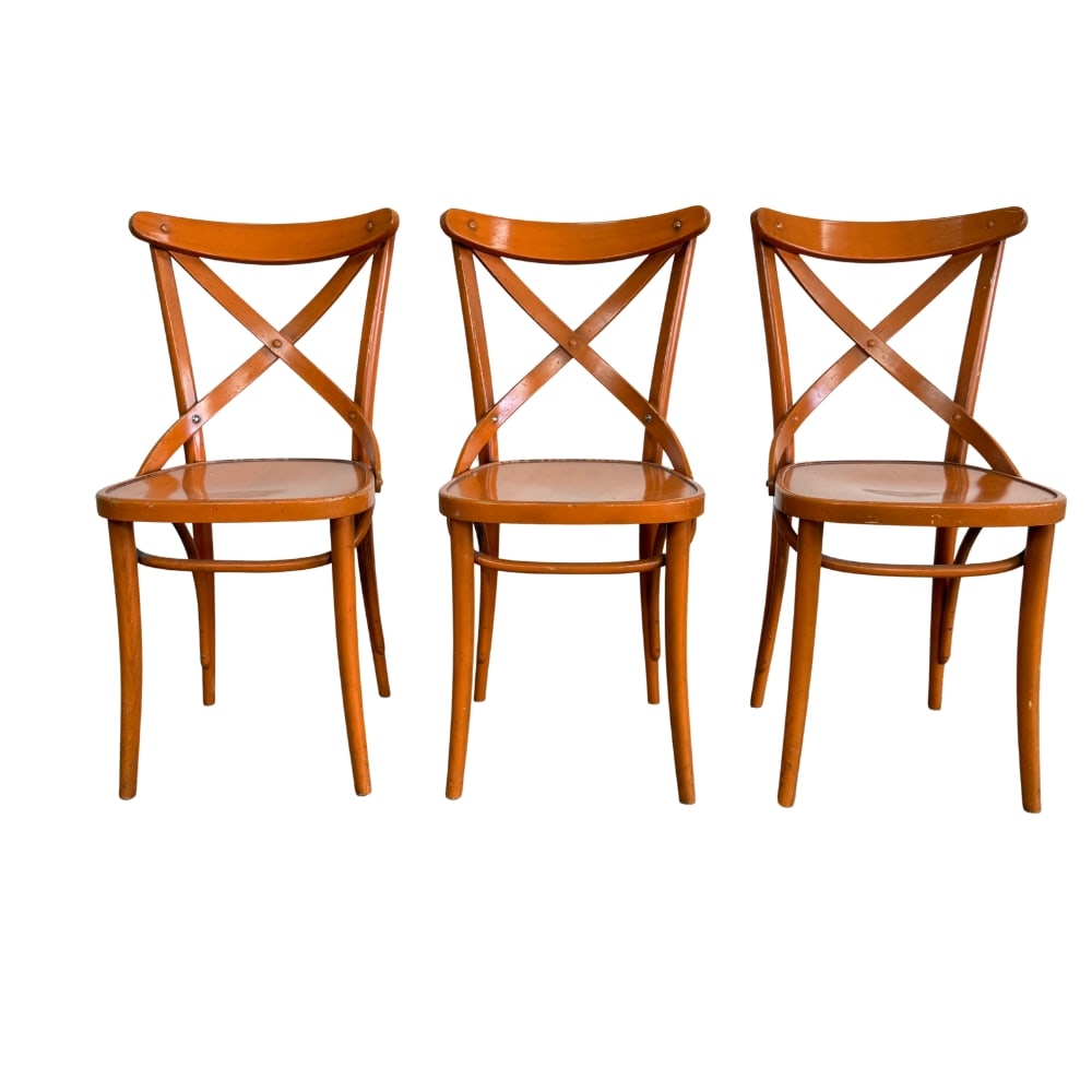 (3) GRANGE DINING CHAIRS: Dimensions: H 33” x W 15.5” x D 21”. Set of 3 French dining chairs from Grange with cross back, all painted in orange.