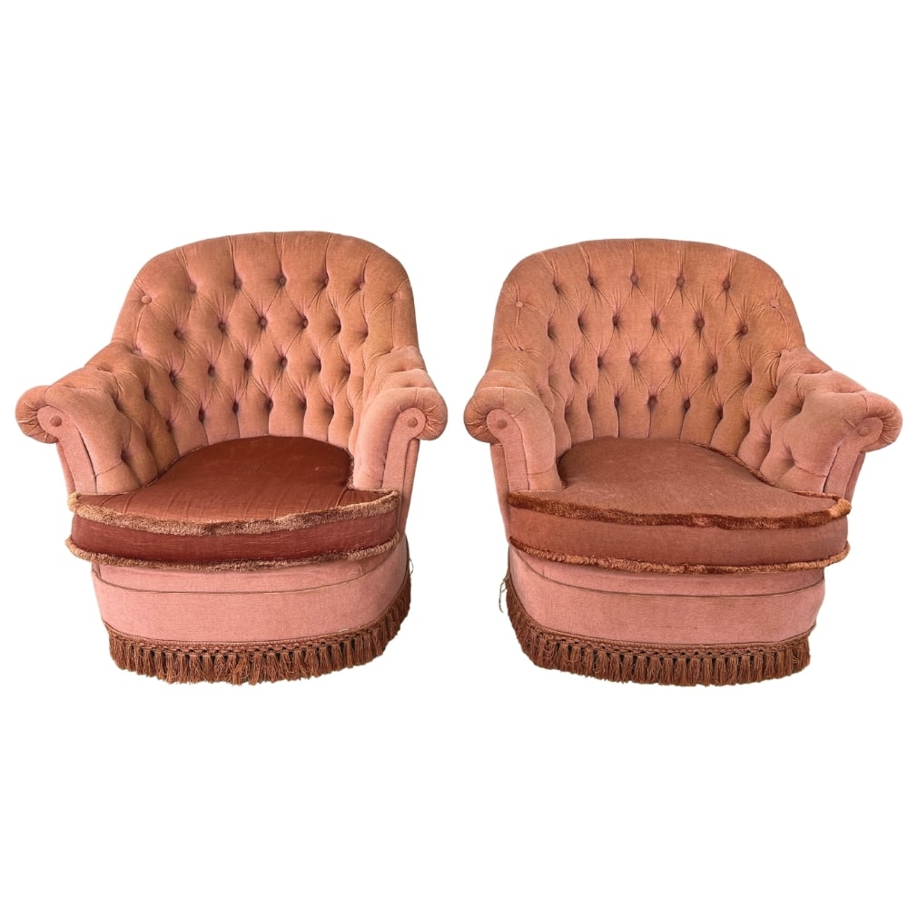 VINTAGE FRENCH PINK ARMCHAIRS, A PAIR: Dimensions: H 30” x W 31.5” x D 30” x SH 15.5”. Set of 2 Vintage French toad armchairs in tufted pink velvet with tassels.
