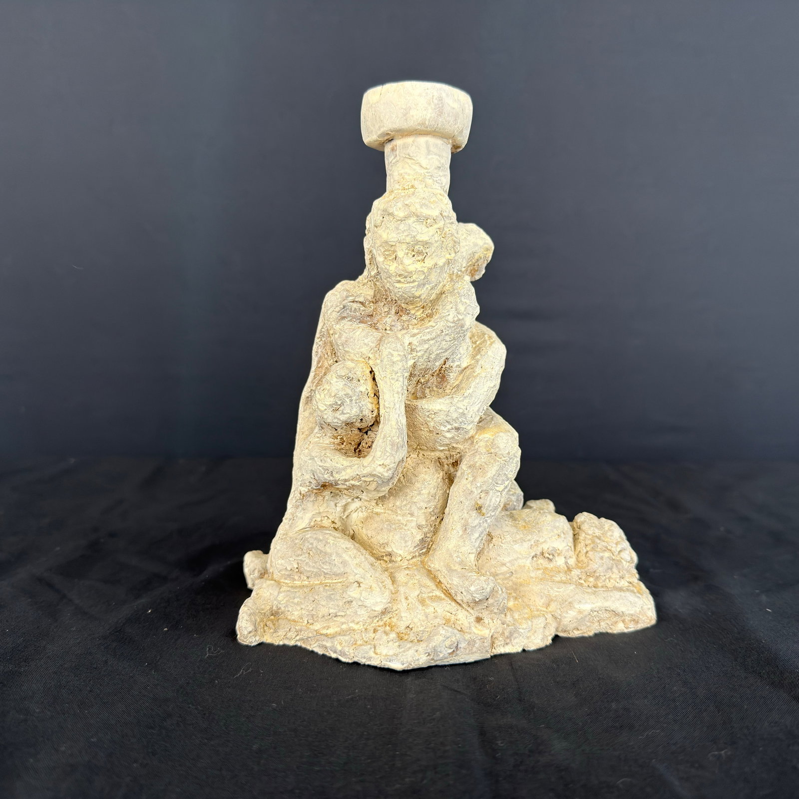 VINTAGE CLAY SCULPTURE: Dimensions: H 8.3” x W 6.5”. Vintage carved clay sculpture candle holder.