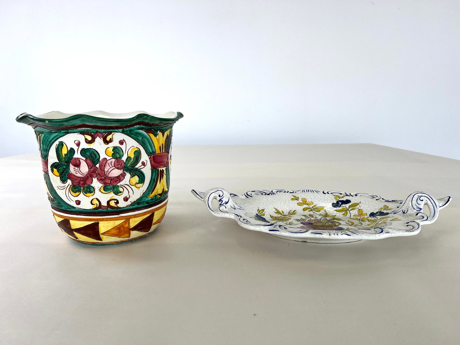 (2) ITALIAN FLOWER POT AND PORCELAIN PLATE: Dimensions: H 8" x W 9.5". Italian handmade and painted flower pot and porcelain plate. Dimensions: (plate) W 10.3".