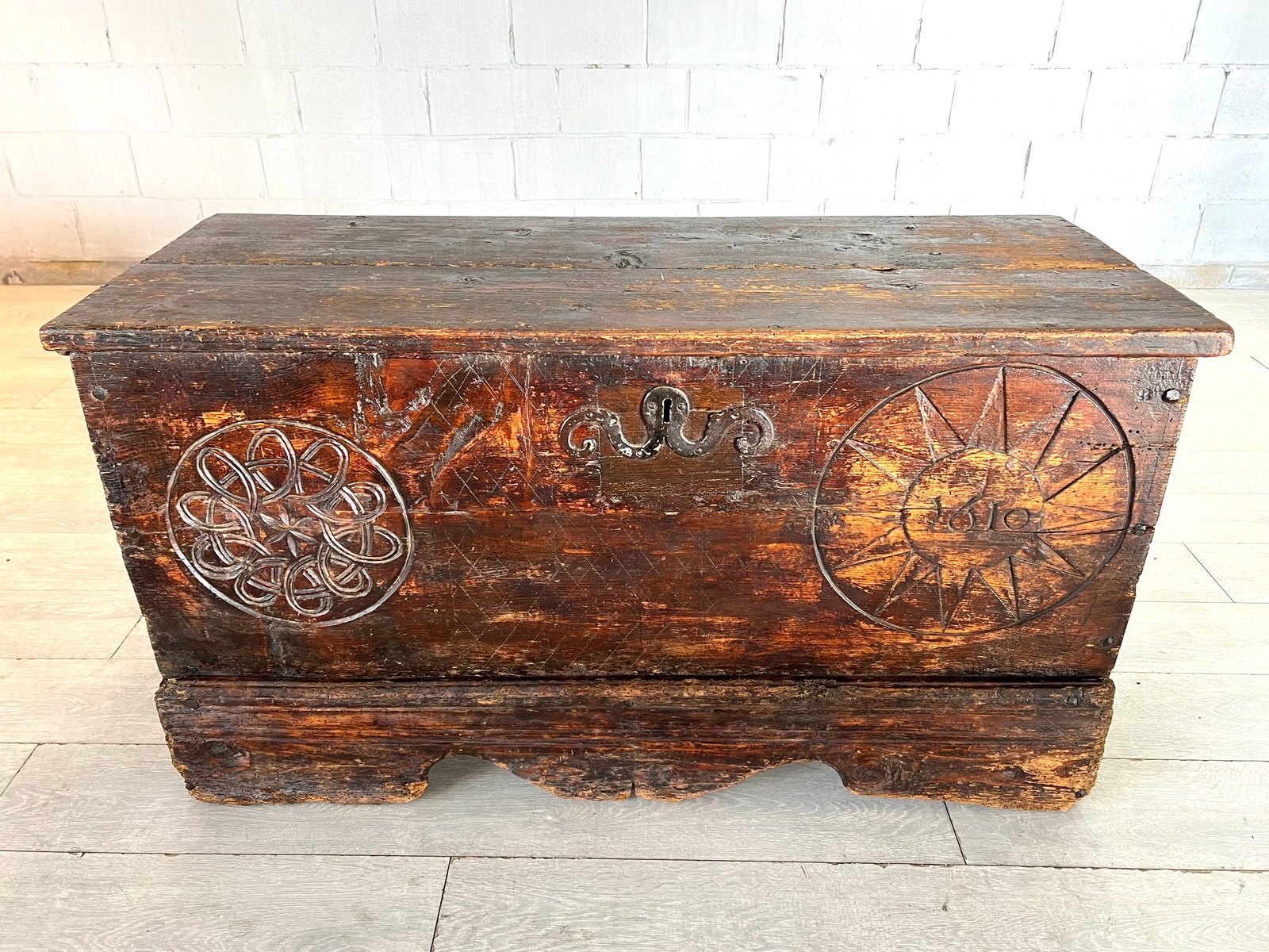 RARE SWISS PINE COFFER CHEST CIRCA 1610: Dimensions: H 27" x W 49" x D 19.5". French Swiss pine chest circa 1610. Truly a rare find.