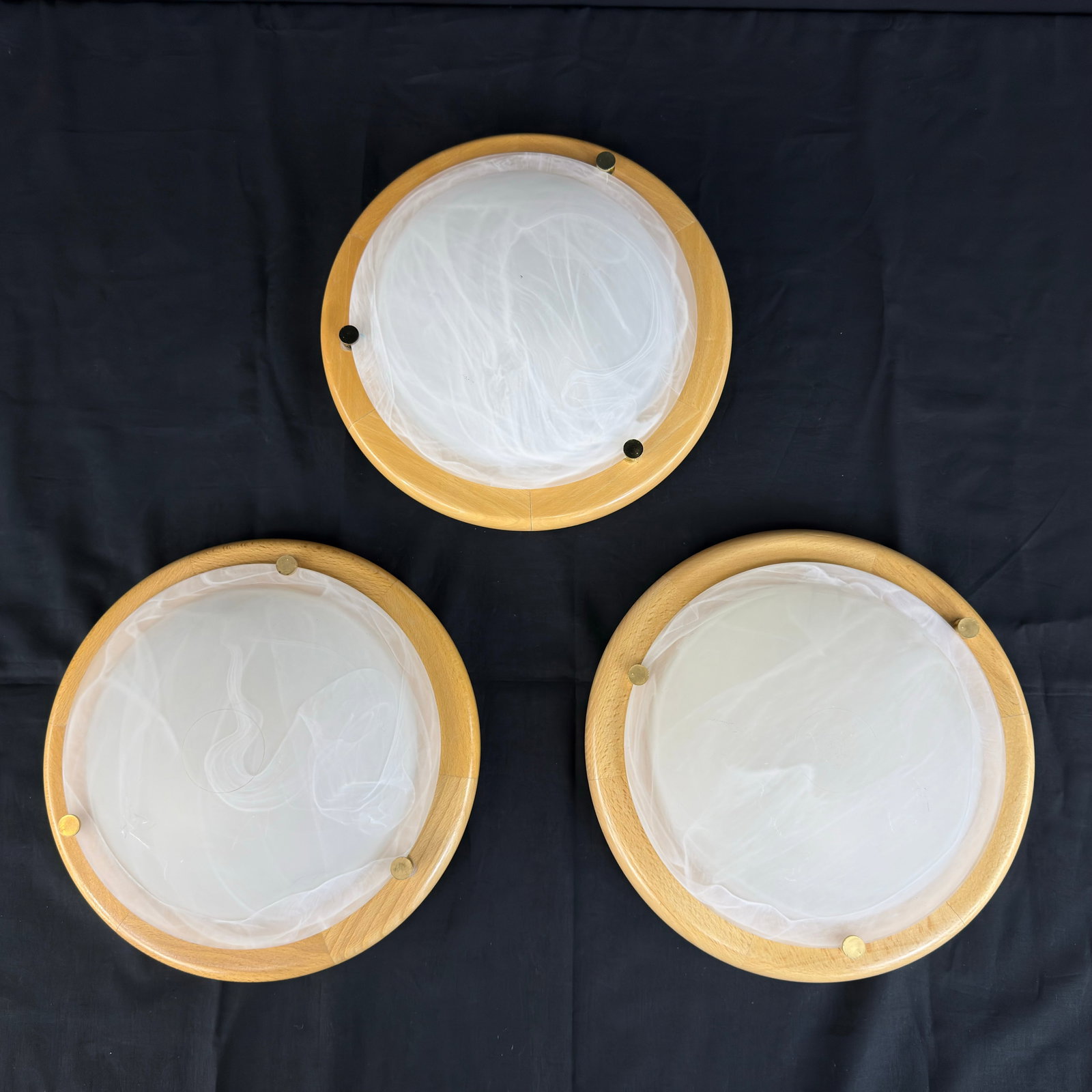 (3) ITALIAN SCONCES OR CEILING LIGHTS: Dimensions: H 4” x W 12”. Set of 3 Vintage Italian ceiling lamps or sconces with wooden frame and frosted glass shades.