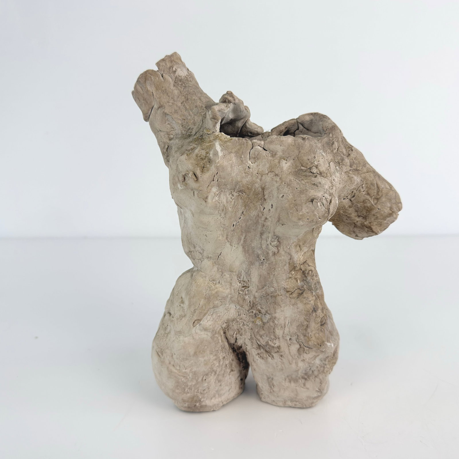 VINTAGE CLAY SCULPTURE: Dimensions: H 10” x W 8”. Vintage hand carved clay sculpture.