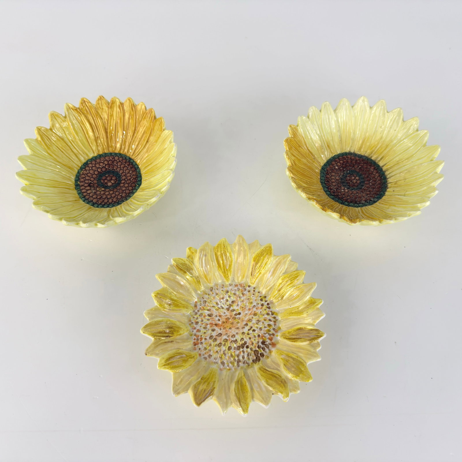 (3) ITALIAN SUNFLOWER BOWLS: Dimensions: W 6”. Set of 3 Vintage Italian hand-painted ceramic sunflower bowls.