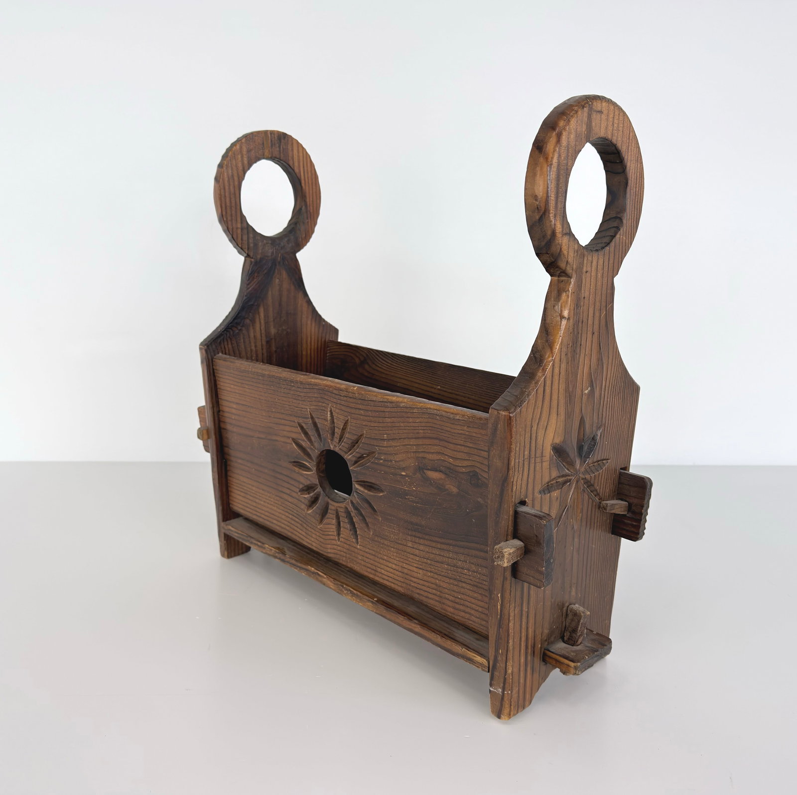 VINTAGE MAGAZINE RACK: Dimensions: H 20.5” x W 18”. Vintage handcrafted wooden magazine rack.
