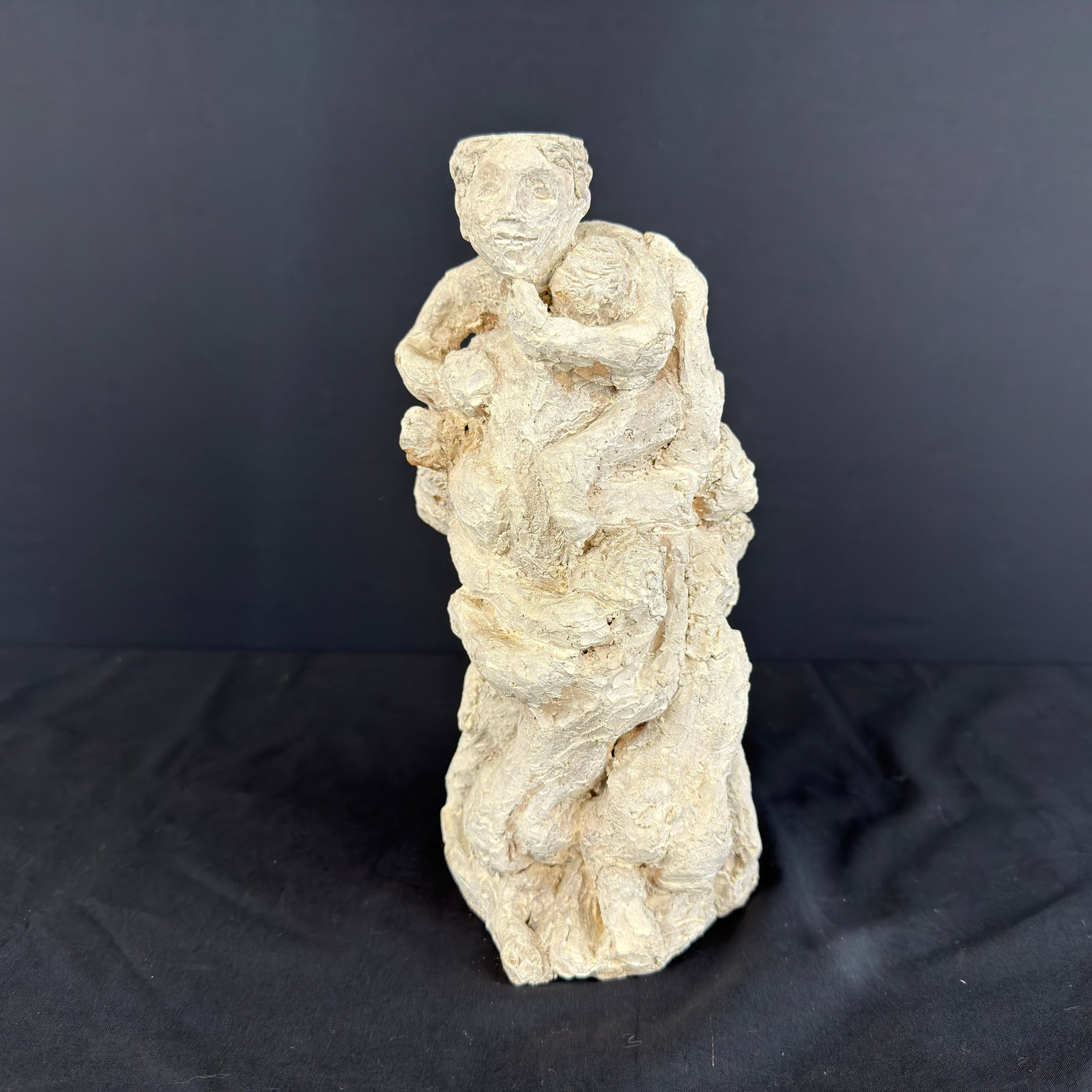 VINTAGE CLAY SCULPTURE: Dimensions: H 11.5” x W 6.5”. Antique carved clay sculpture candle holder.