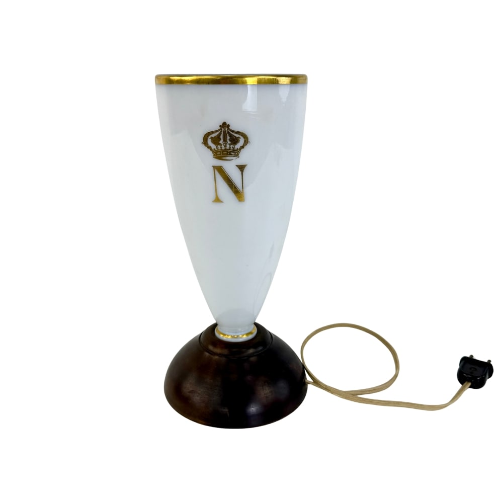 VINTAGE NAPOLEON STYLE TABLE LAMP: Dimensions: H 12.3” x W 5.5”. Vintage French Napoleon style porcelain table lamp with wooden base.