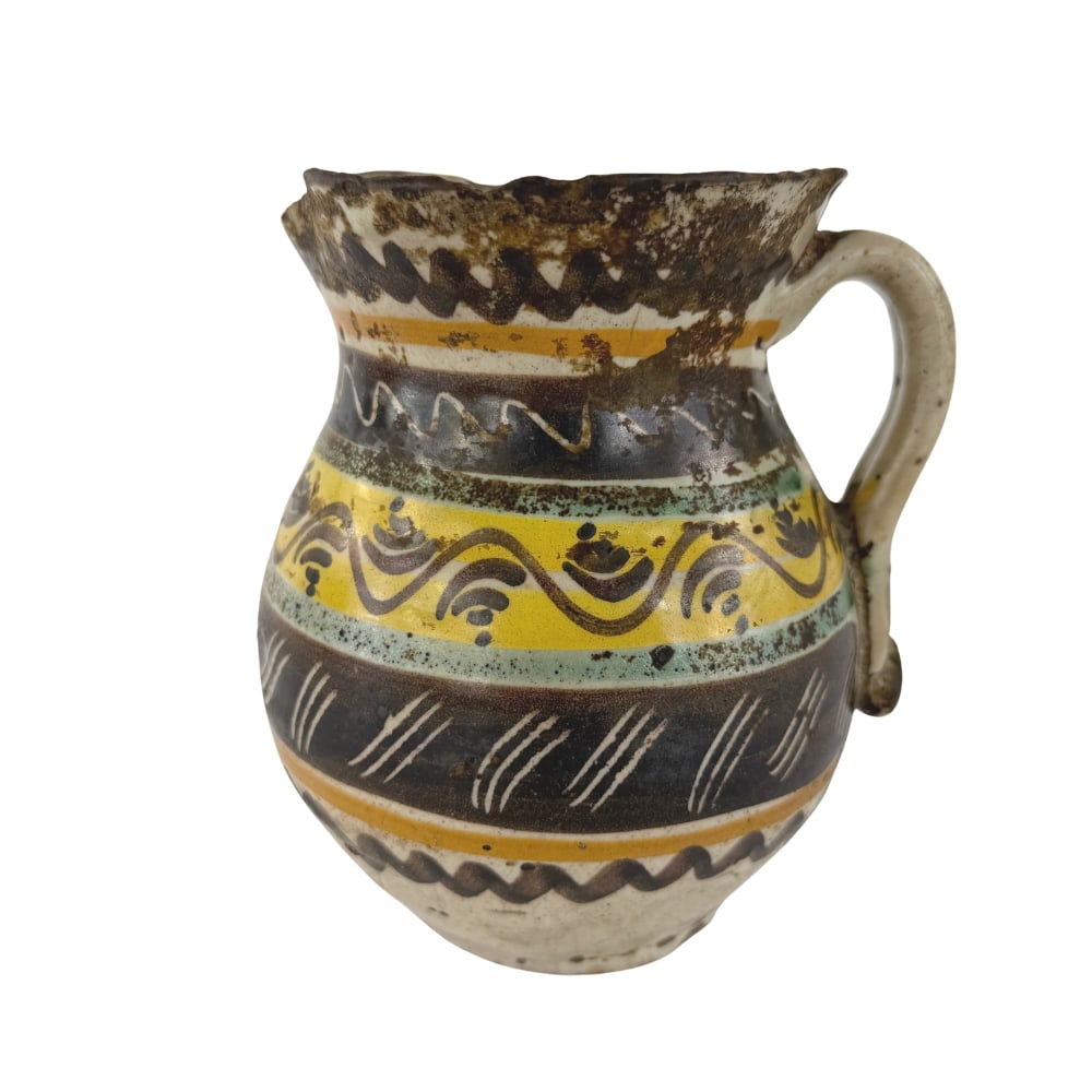 HAND PAINTED CERAMIC JUG: Dimensions: H 6.5” x W 5.5”. Antique handmade ceramic jug.