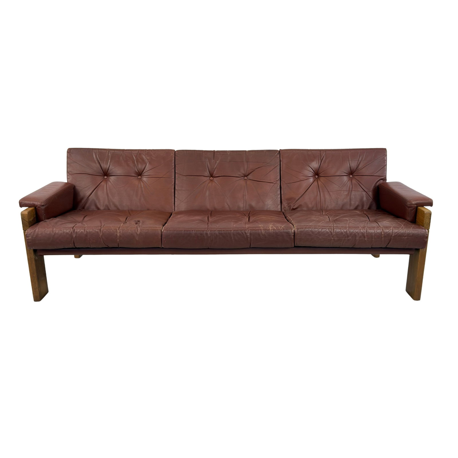 MARTIN VISSER FOR SPECTRUM THREE-SEATER SOFA: Dimensions: H 27.5” x W 79.5” x D 30.5” x SH 17”. Vintage brown leather three-seater sofa designed by Martin Visser for Spectrum Netherlands 1960s.