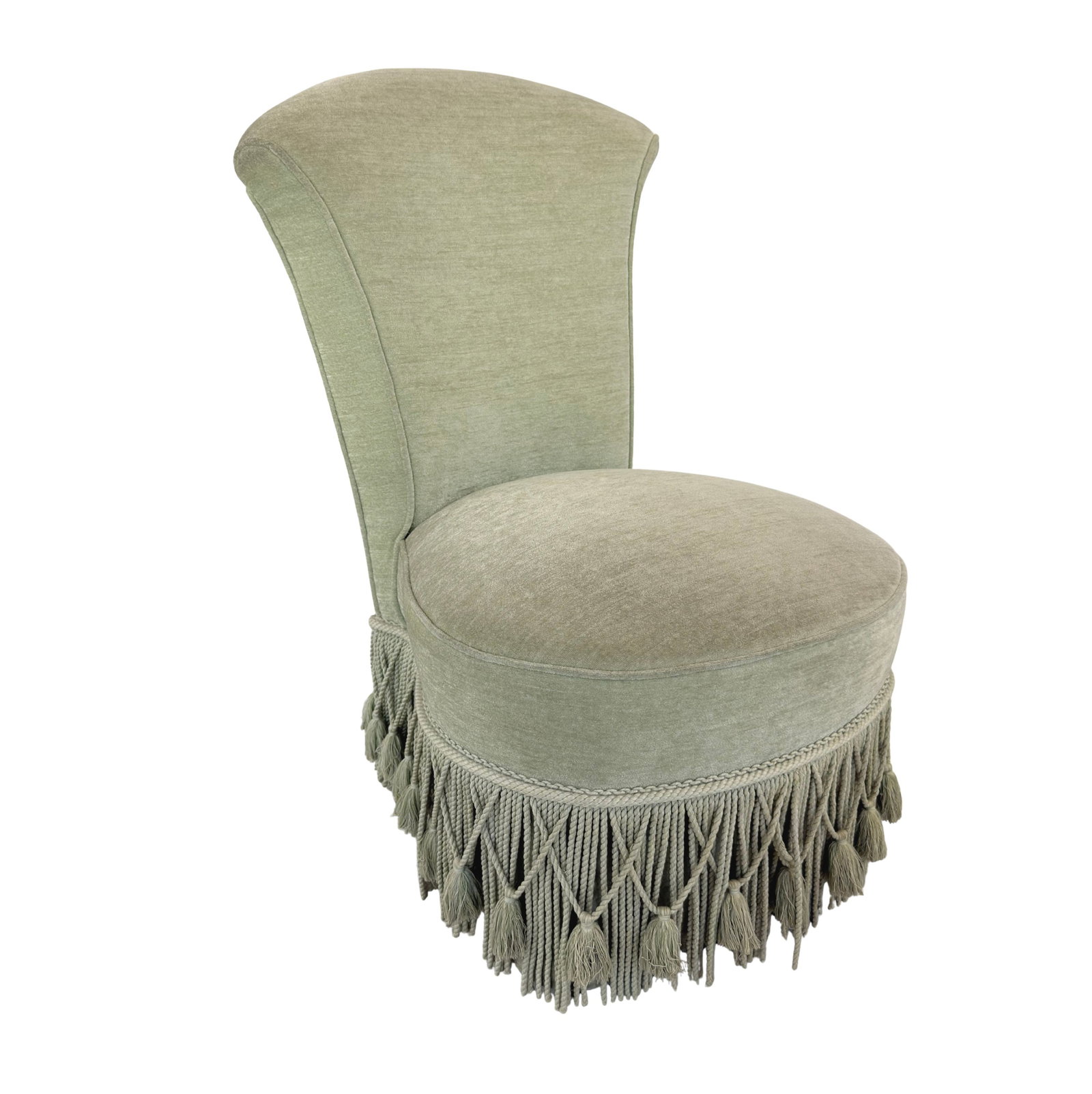 FRENCH TOAD LOUNGE CHAIR: Dimensions: H 33” x W 20” x D 25” x SH 17.5”. Vintage French Toad lounge chair in original light green fabric with fringes.