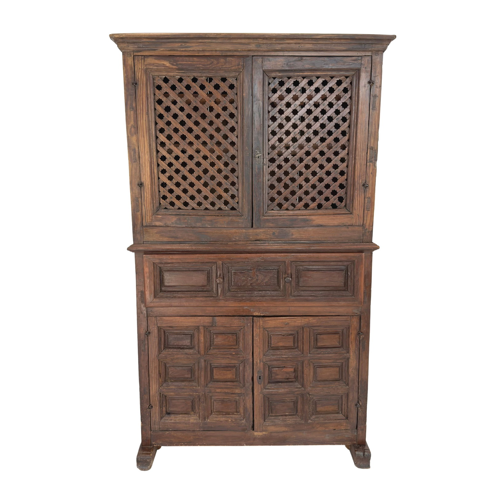 ANTIQUE SPANISH BRUTALIST KITCHEN BUFFET: Dimensions: H 78.5” x W 45” x D 19”. Antique Spanish brutalist carved wood kitchen buffet with one central drawer and two cupboards with shelves. Consist of two parts.