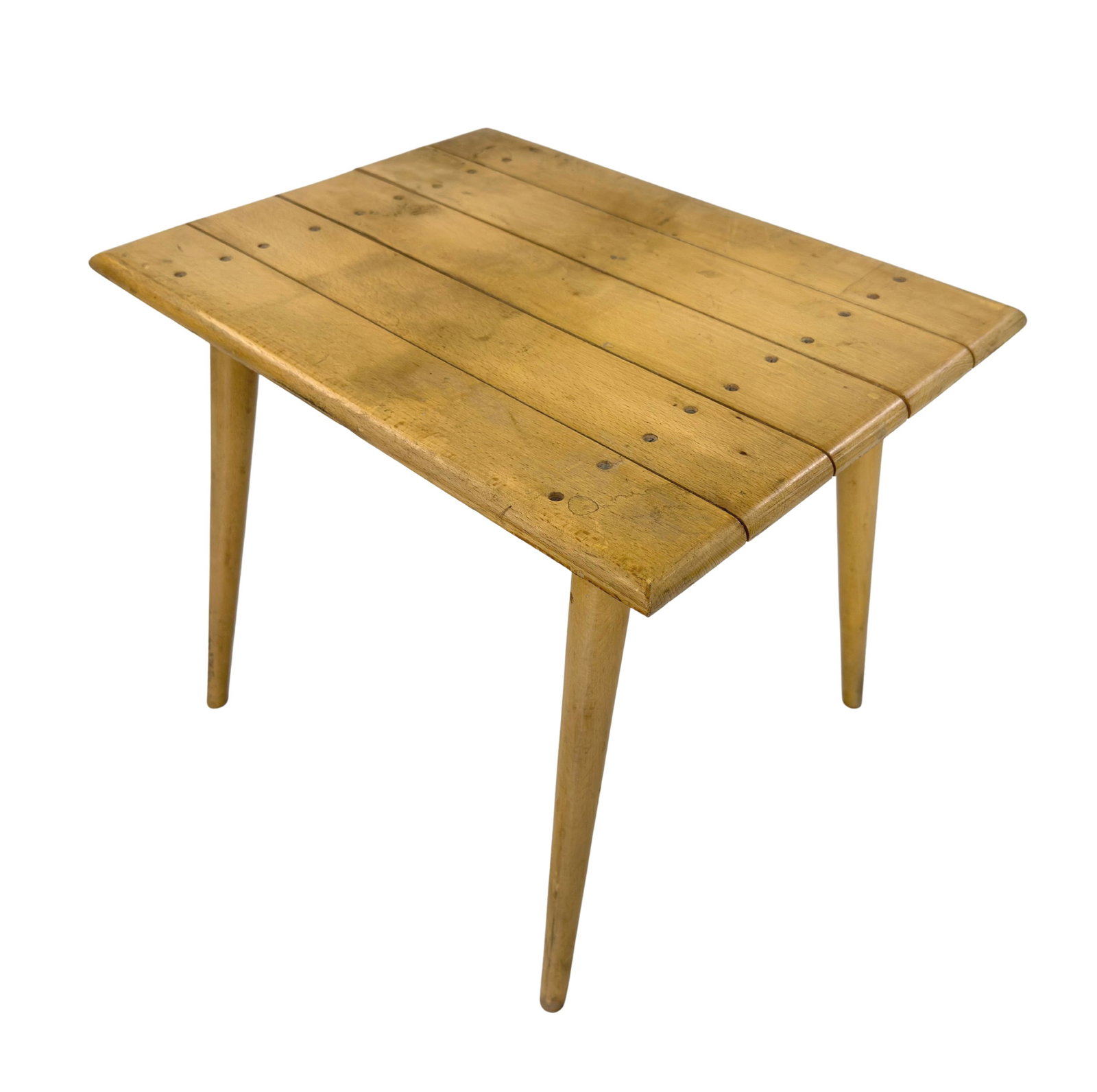 SIDE TABLE MANNER OF PAUL MCCOBB: Dimensions: H 16.7” x W 19.7” x D 15”. Vintage wooden side table manner of Paul Mccobb with four tapered legs.