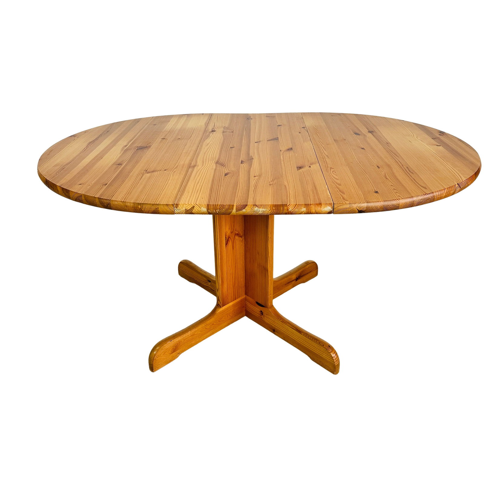 RAINER DAUMILLER EXTENDABLE DINING TABLE: Dimensions: H 29.5” x W 42”. Vintage Danish round extendable pine dining table designed by Rainer Daumiller in the 1970s. Dimensions: extended 58.3”.