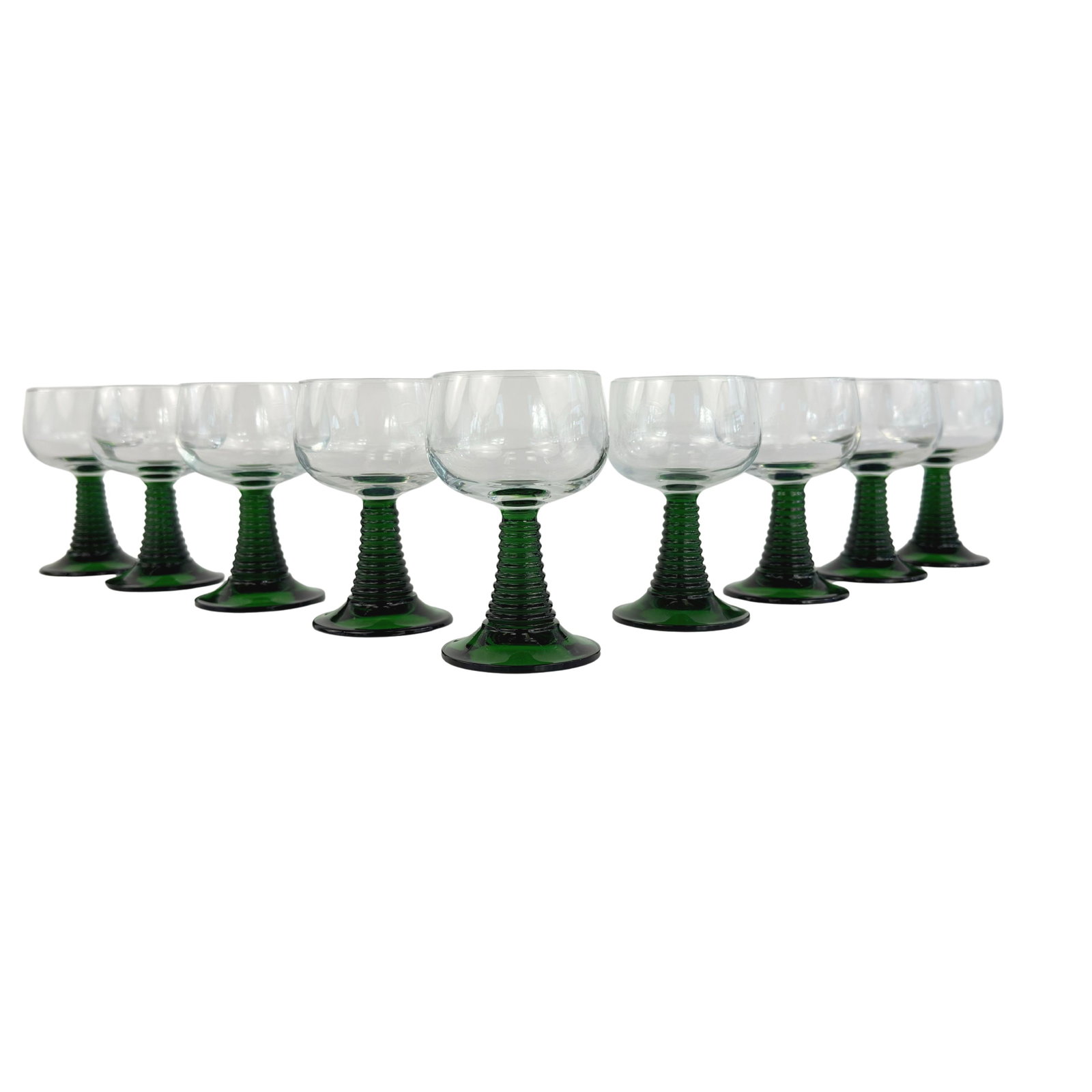 (9) LUMINARC FRENCH WINE GLASSES: Dimensions: H 4.5” x W 2.5”. Set of 9 Luminarc French wine glasses with green ribbed beehive stem.