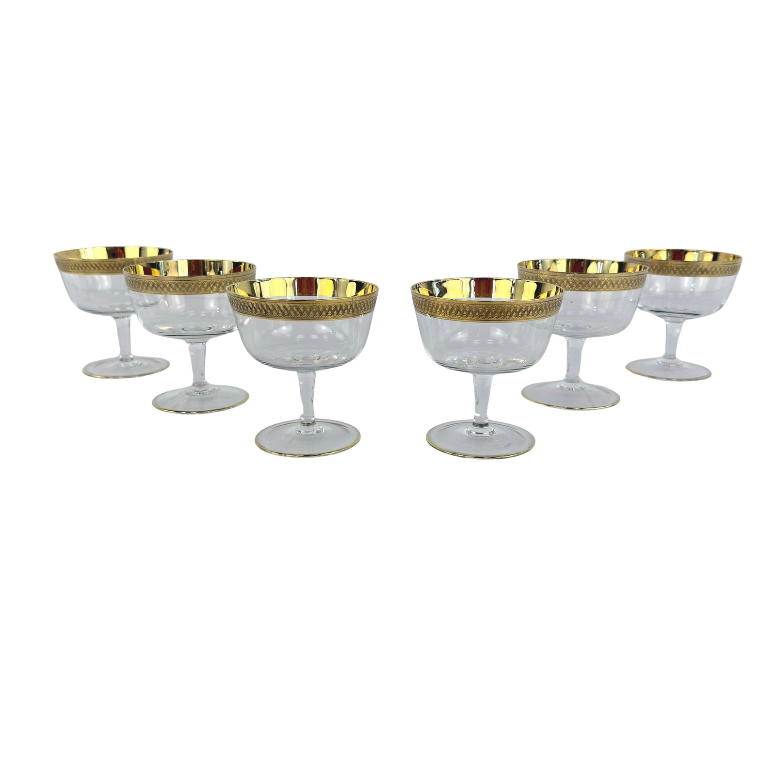 (6) CRYSTAL CHAMPAGNE GLASSES ATTR TOSCA: Dimensions: H 3.7” x W 3.5”. Set of 6 Vintage crystal champagne glasses with gold-trimmed rim attr. Lingby Glasvaerk Tosca.