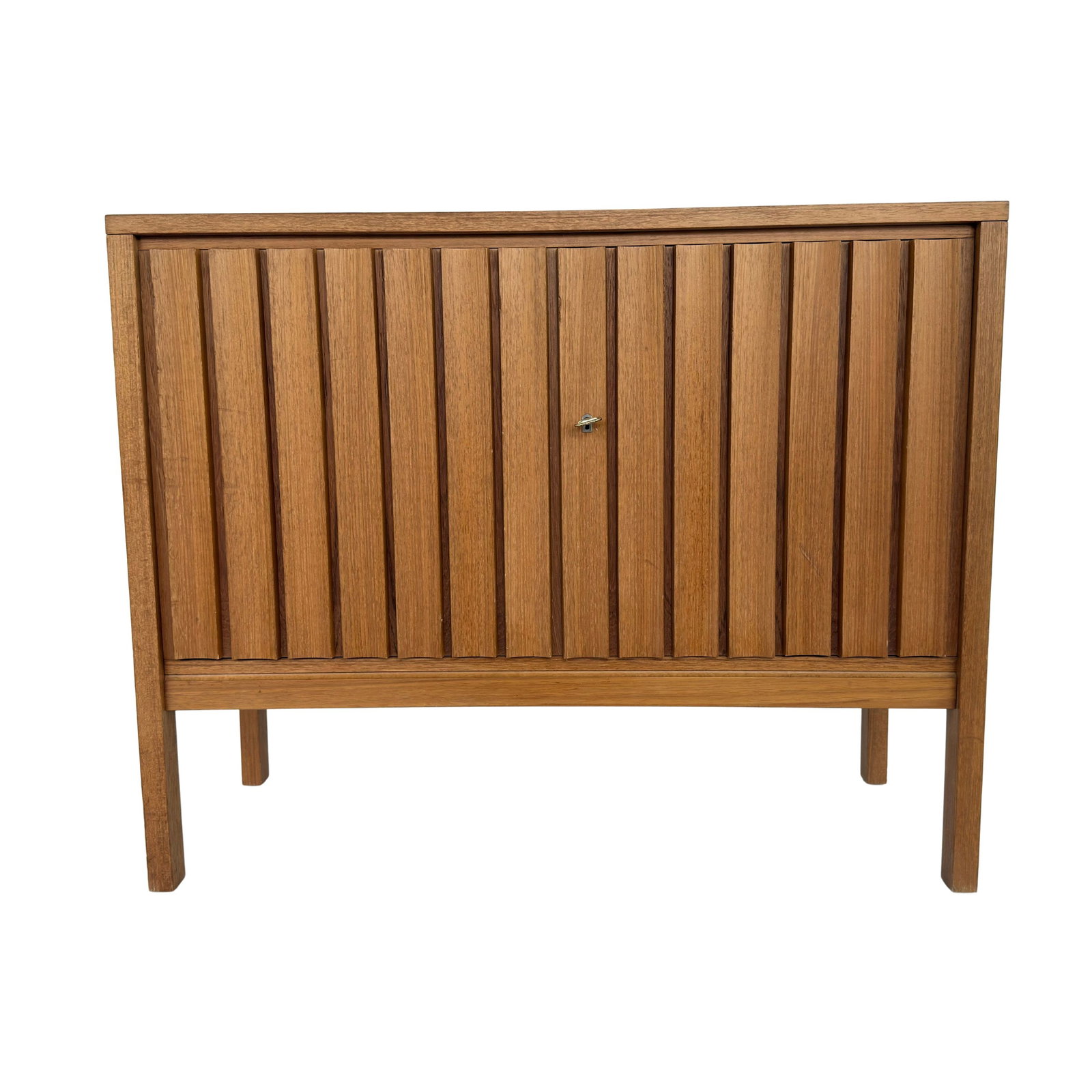 LEO BUB FOR BUB WERTMOBEL SIDEBOARD: Dimensions: H 33.5” x W 41.7” x D 17.3”. Vintage sideboard designed by Leo Bub for Bub Wertmobel in the 1960s, featuring cupboard with wood slats doors with shelf inside.