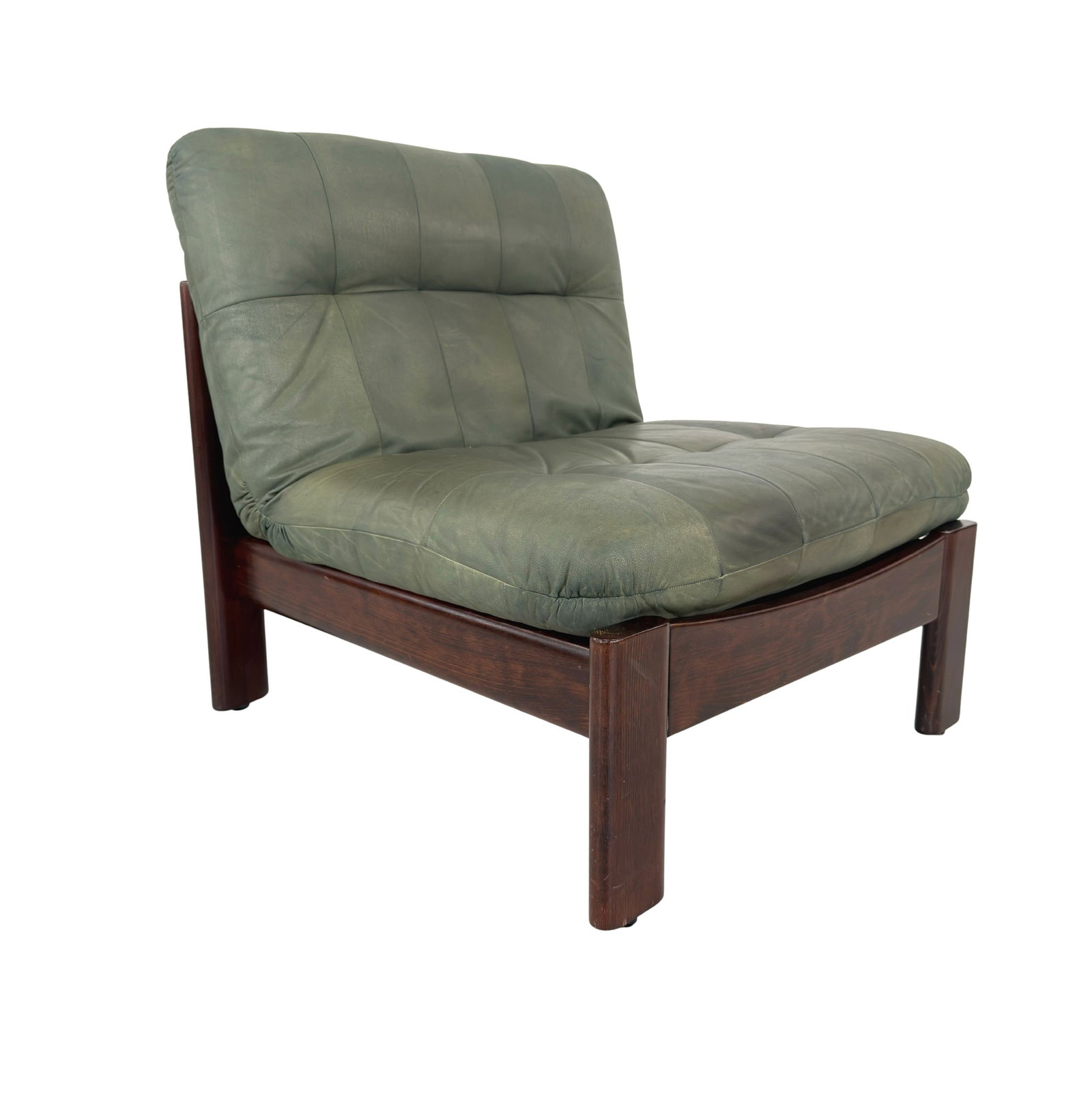 LEATHER LOUNGE CHAIR ATTR. CARL STRAUB: Dimensions: H 31.5” x W 29.5” x D 35” x SH 16". Vintage Brutalist lounge chair attr. to Carl Straub with dark wood frame and green leather loose padded cushion.