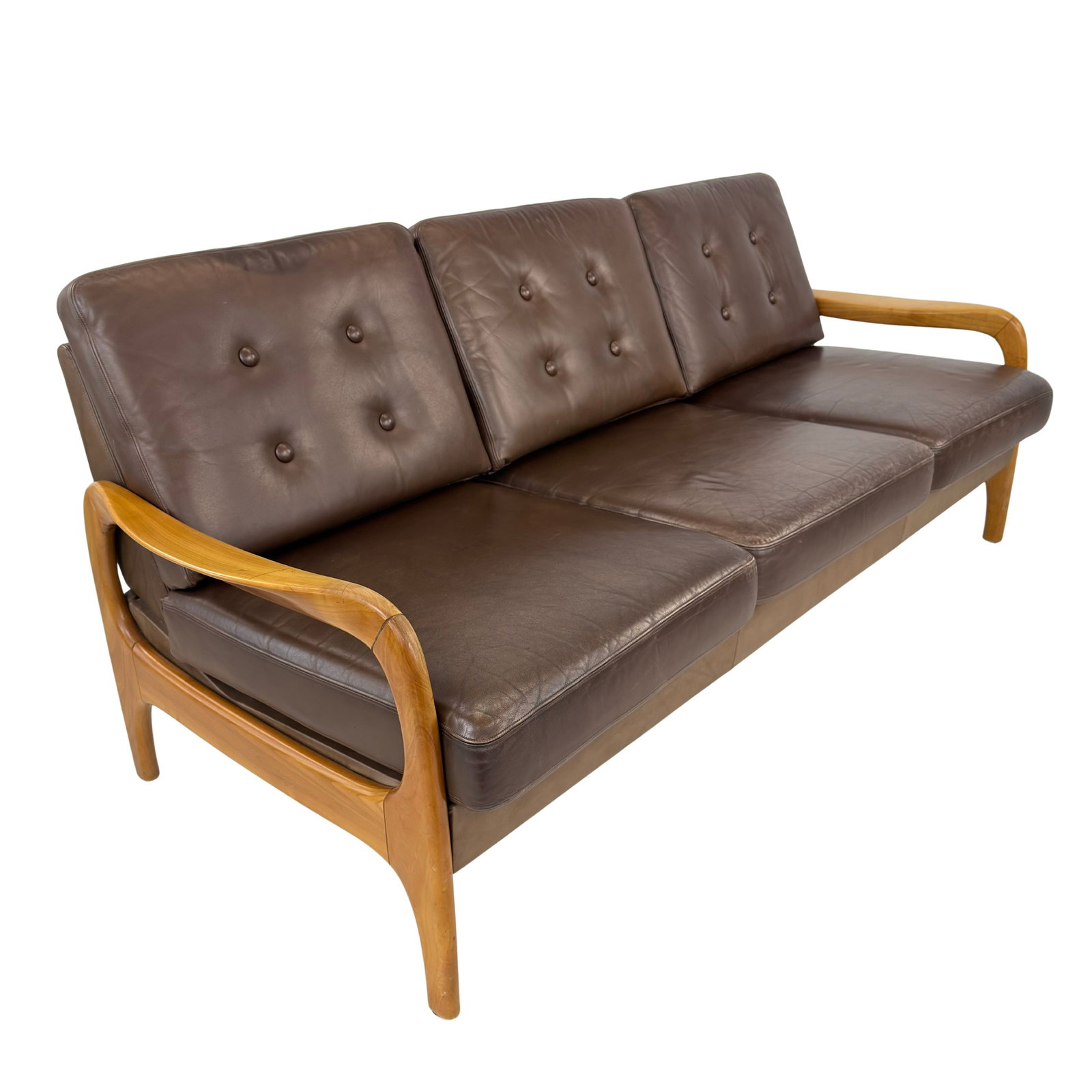 DANISH LEATHER SOFA BY HOLSTEBRO: Dimensions: H 33” x W 78” x D 35” x SH 18”. Vintage Danish three-seater sofa manner of Holstebro in original brown leather with loose padded cushions.