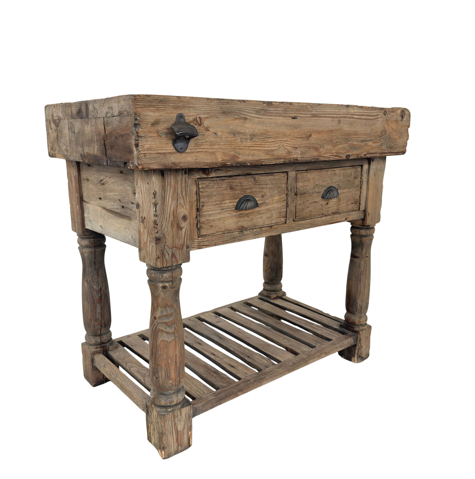 ANTIQUE FRENCH PINE BUTCHER’S BLOCK: Dimensions: H 36” x W 39” x D 24”. Antique French pine butcher’s block with two drawers and a bottom shelf.