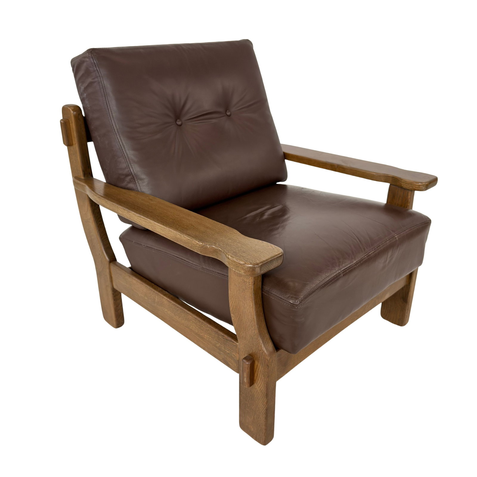 BELGIAN BRUTALIST LOUNGE CHAIR: Dimensions: H 34” x W 31” x D 33” x SH 18”. Vintage Belgian Brutalist oak dark brown leather lounge chair with loose padded cushions.