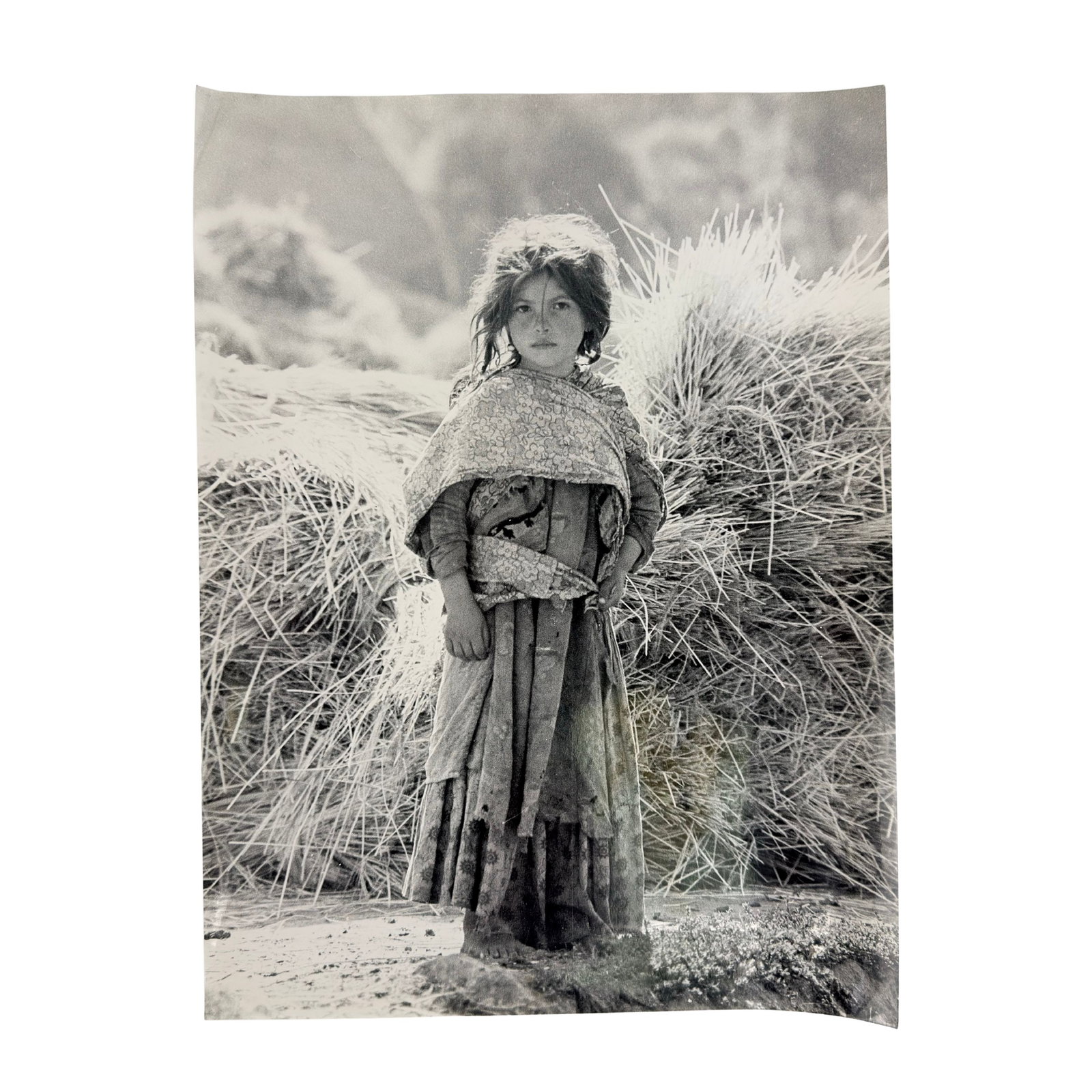 BLACK AND WHITE PHOTOGRAPH: Dimensions: H 16” x W 12”. Vintage black and white photograph of a young girl. (63)