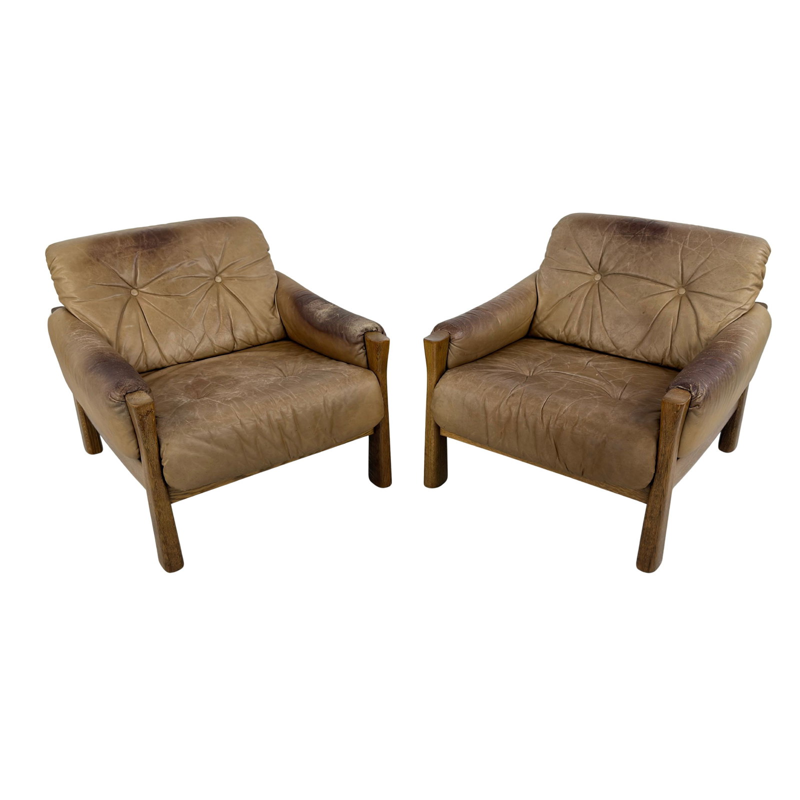 VINTAGE BRUTALIST LEATHER ARMCHAIRS, A PAIR: Dimensions: H 29.5” x W 29.5” x D 33". Pair of Vintage Brutalist oak light brown leather lounge chairs SG Model, 1970s.