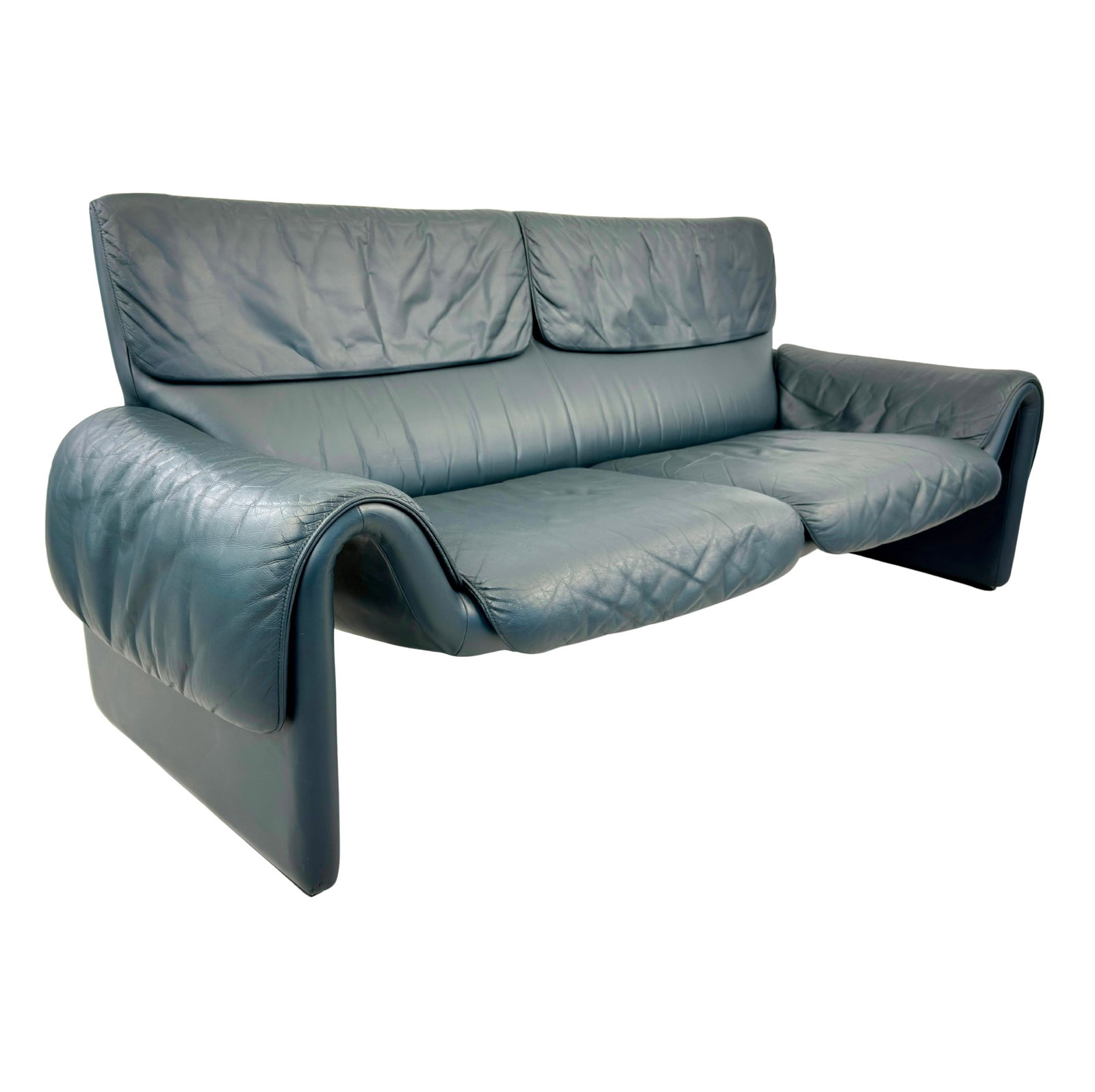 DE SEDE DS 2011 LEATHER SOFA: Dimensions: H 33" x W 72" x D 30" x SH 16" . Dark blue/green leather DS 2011 two-seater sofa from De Sede with removable armrest and backrests, 1970s. Custom color.