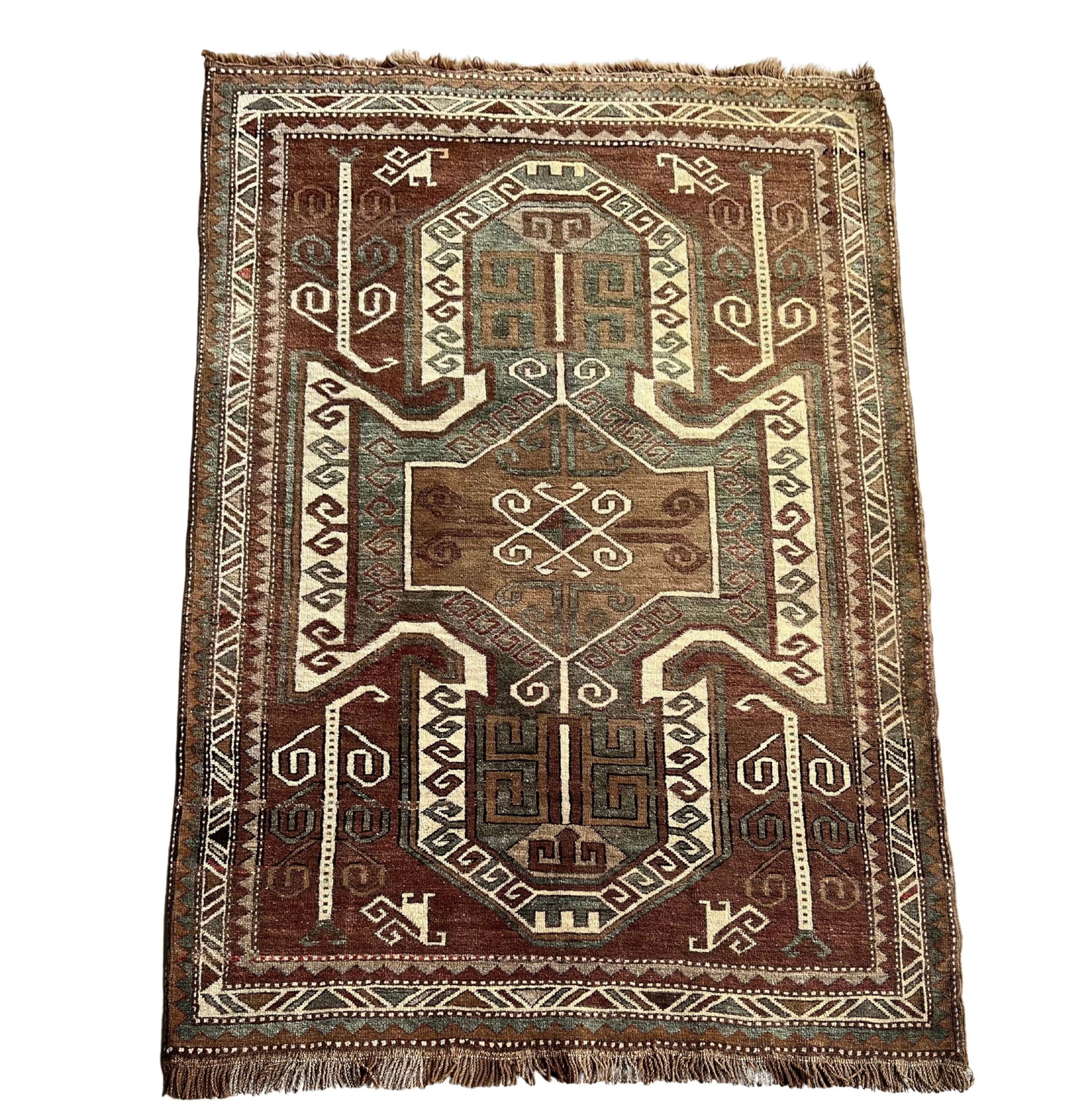 TURKISH KAZAK SHIELD RUG: Dimensions: H 6'11" x W 4'5". Turkish Kazak shield hand knotted rug.